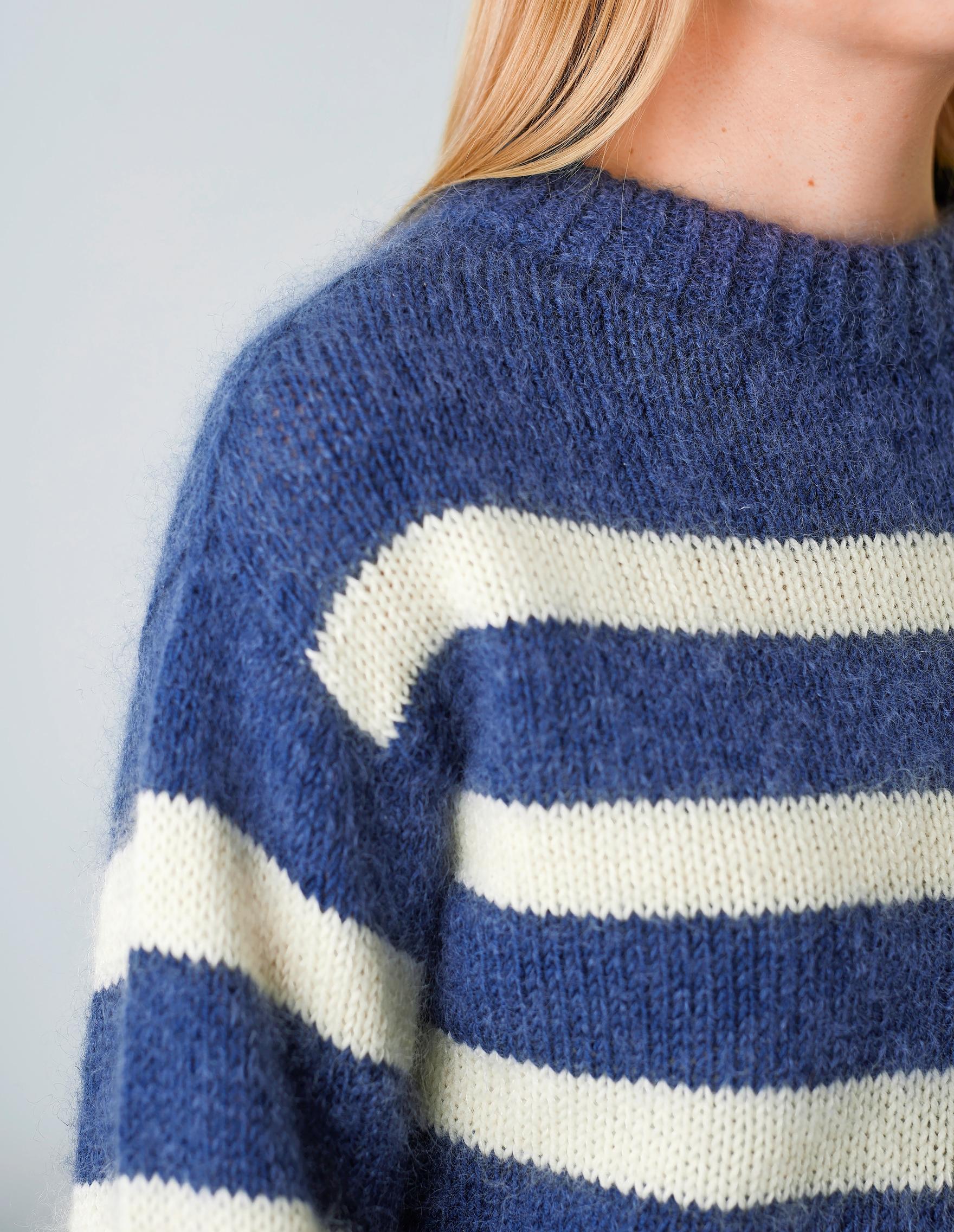 Two-color striped sweater on the model