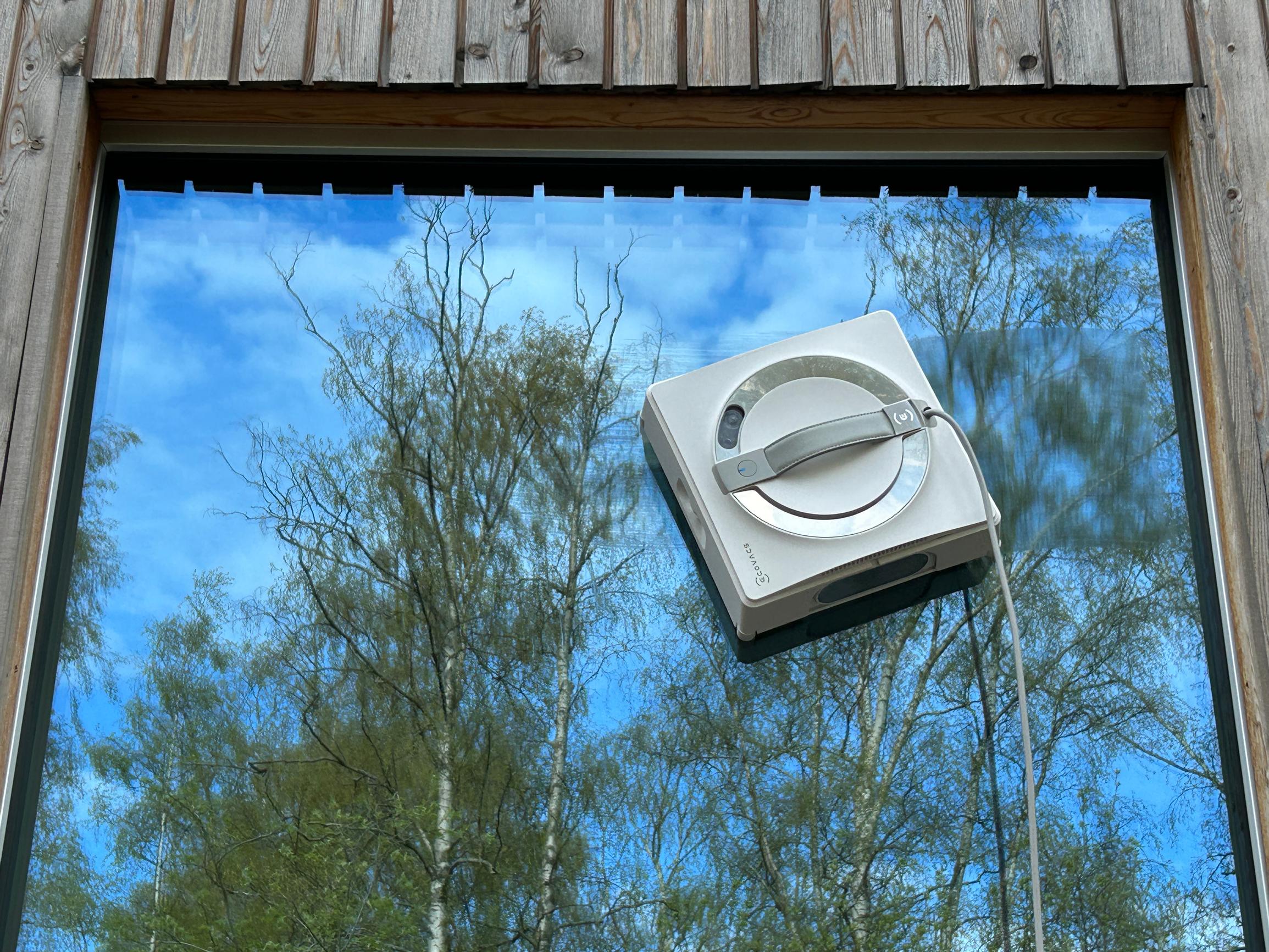 The window-cleaning robot cleans the window.