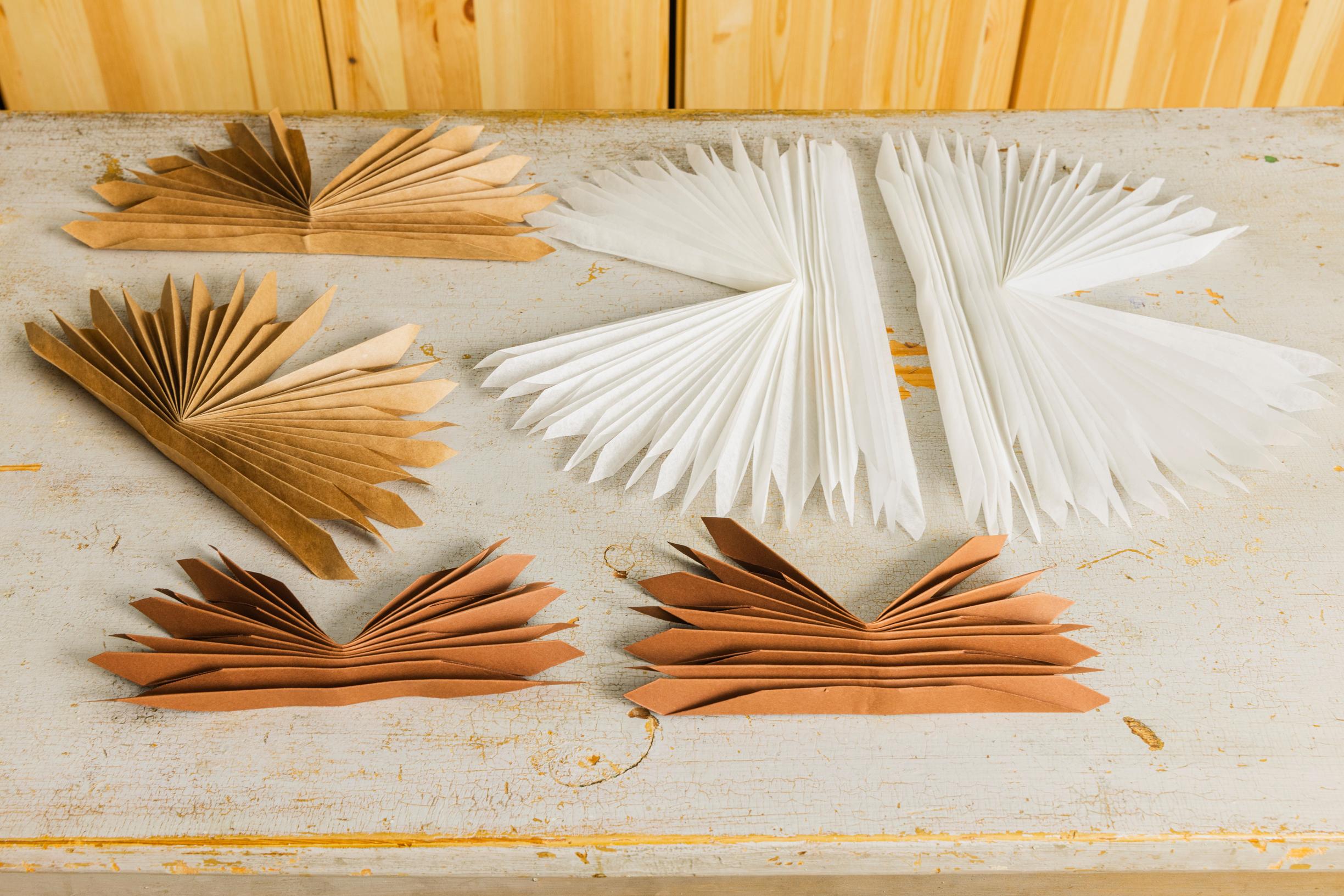 Layered star step 5: each piece is folded in the same manner.