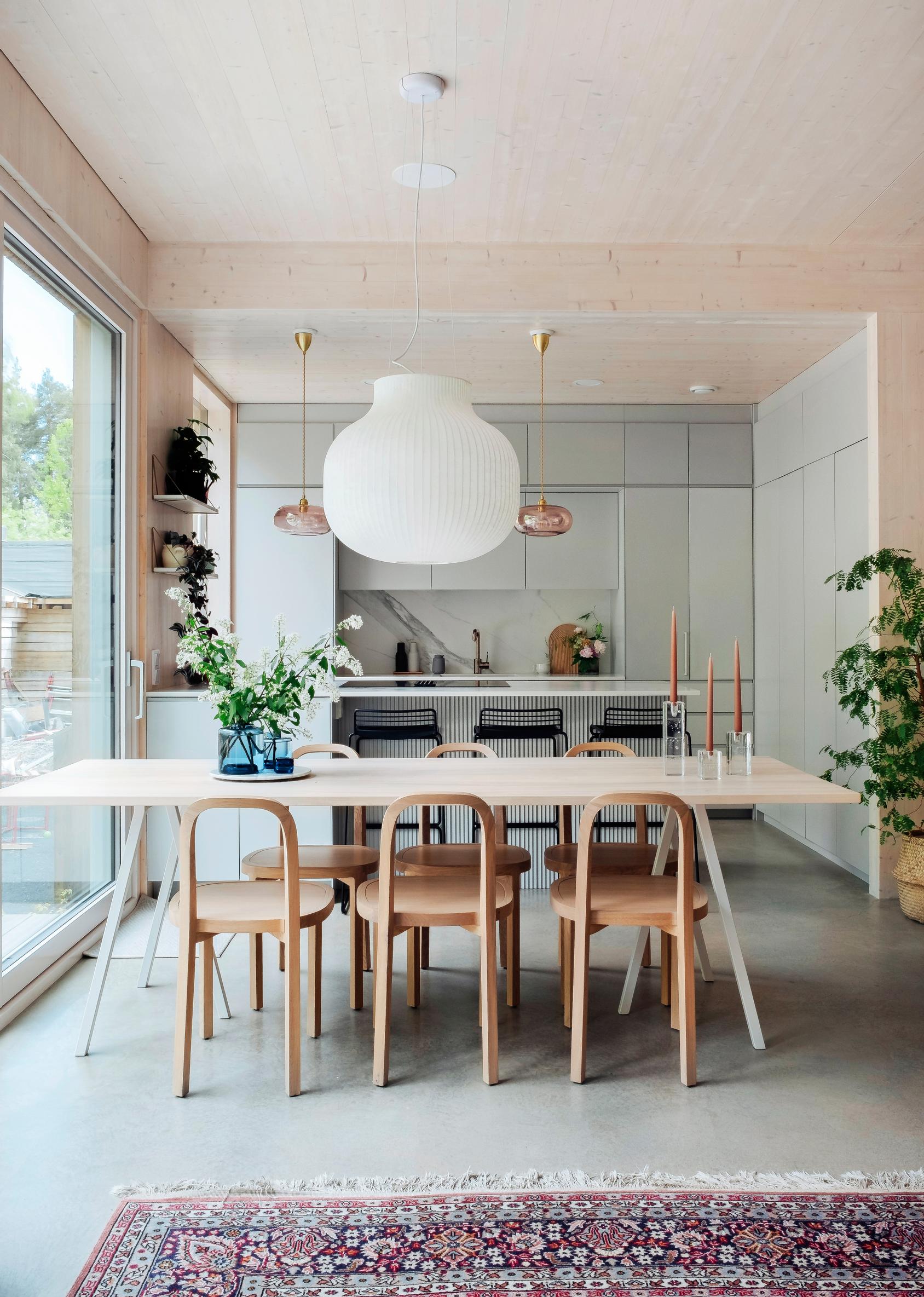 Dining area and a kitchen made from IKEA frames and cabinetmaker doors