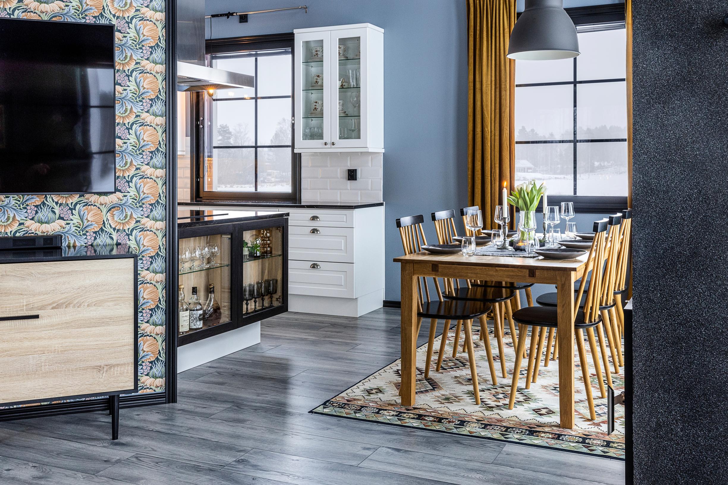 A dining set in the spacious kitchen-living area.