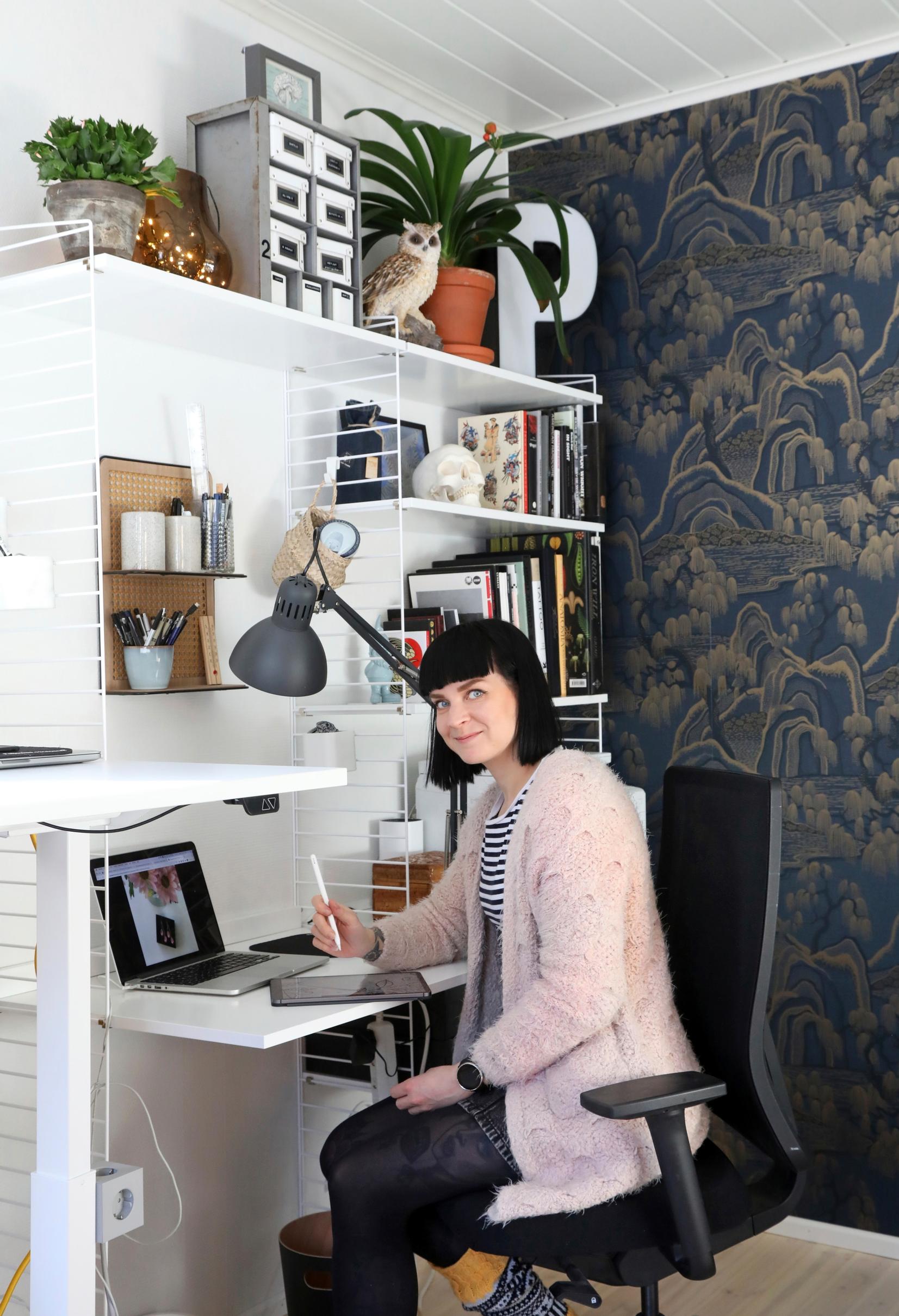 Outi at her workstation