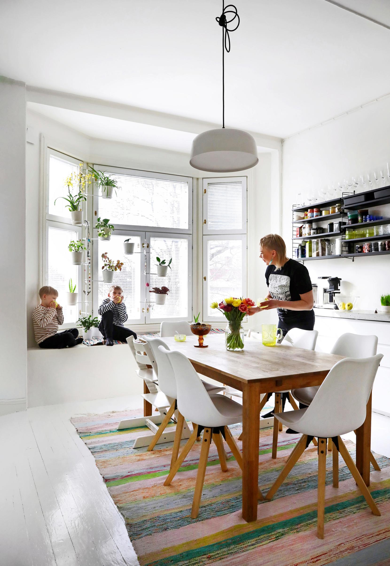 A combination seating and storage solution in the kitchen bay window