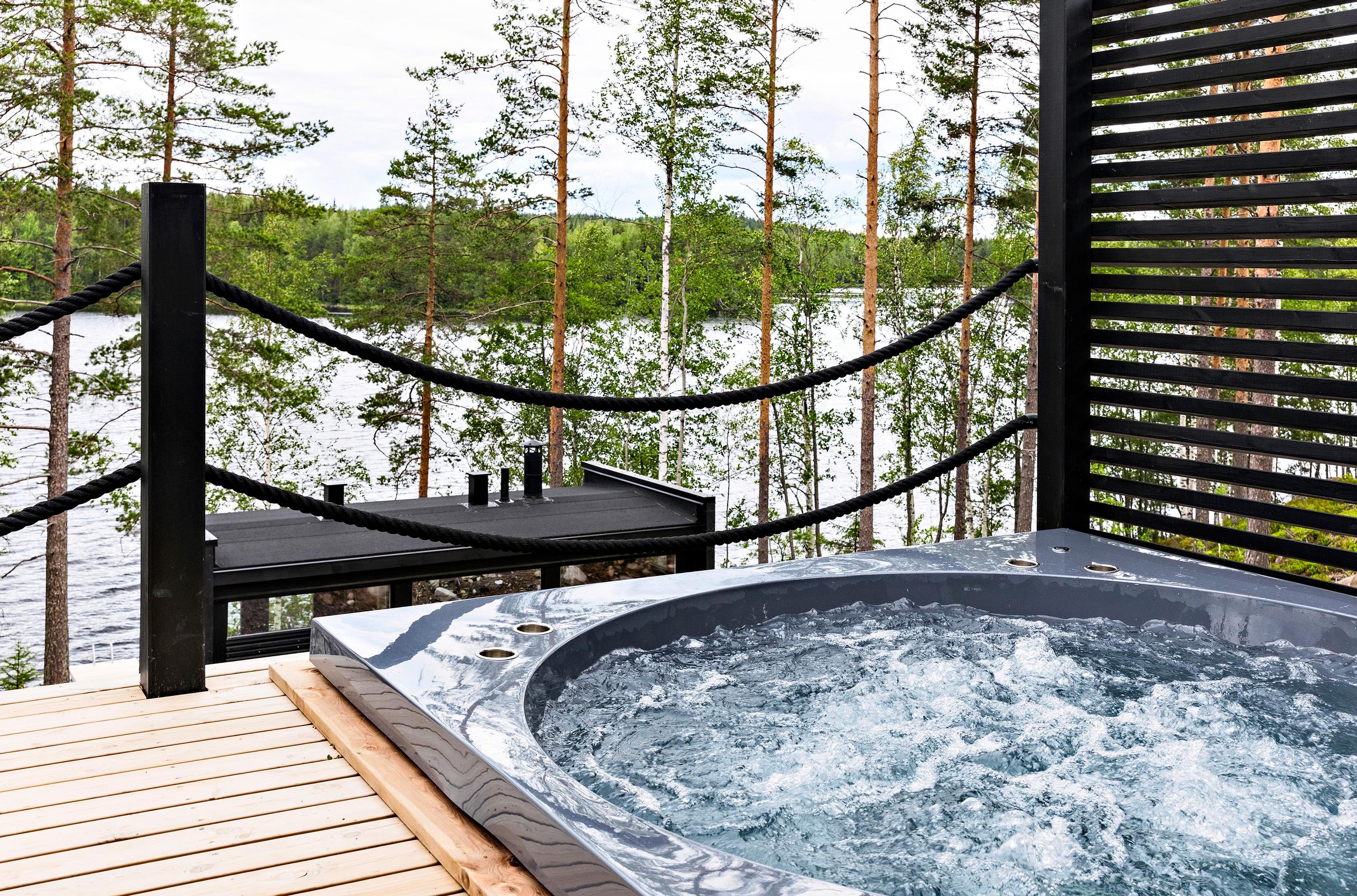 A Drop outdoor hot tub on a cottage deck