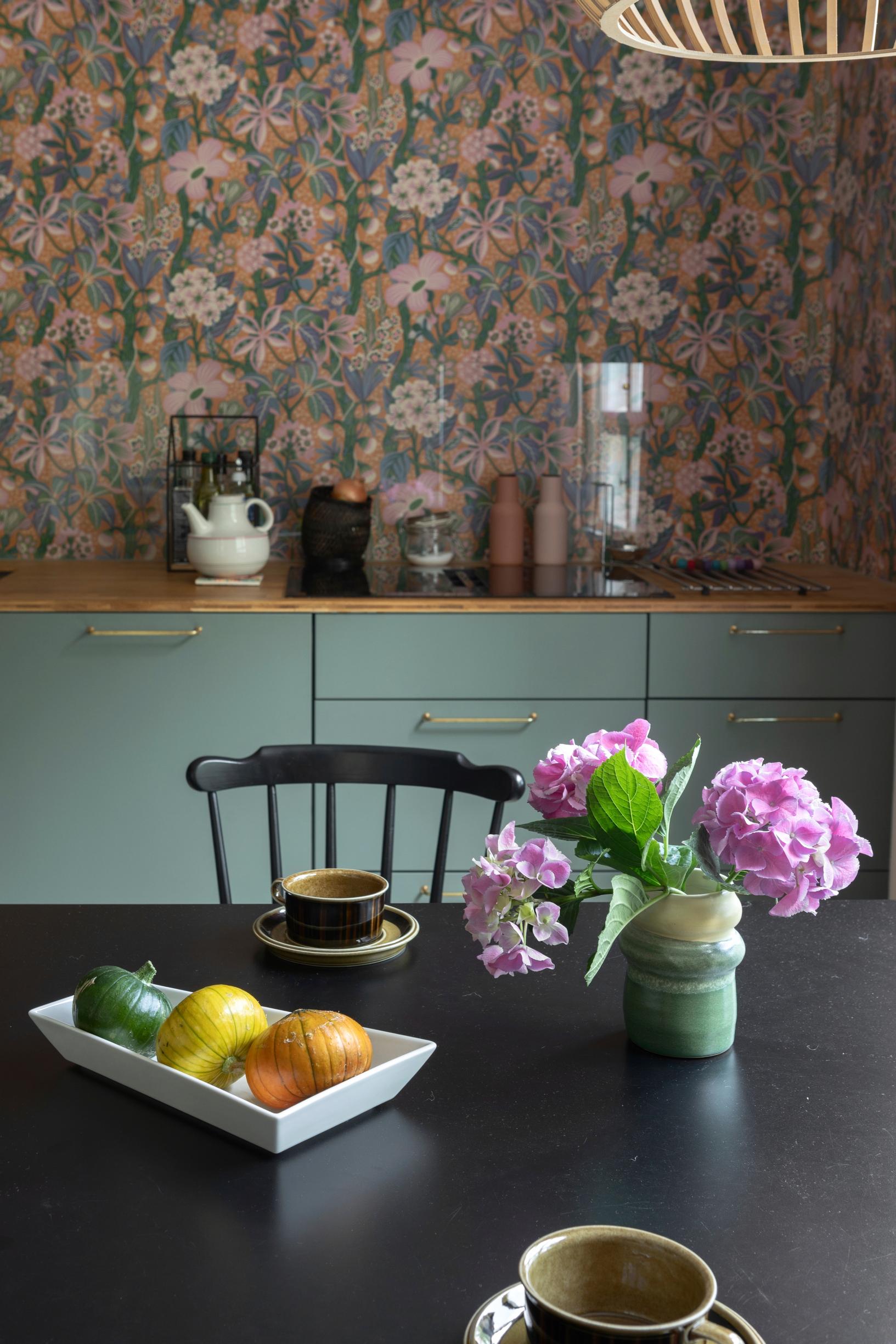 Flowers in a vase on the kitchen table