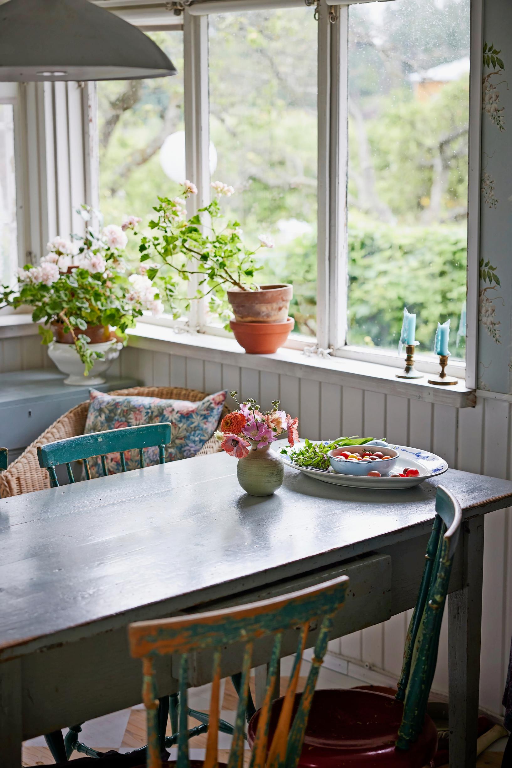 an old dining table by the window