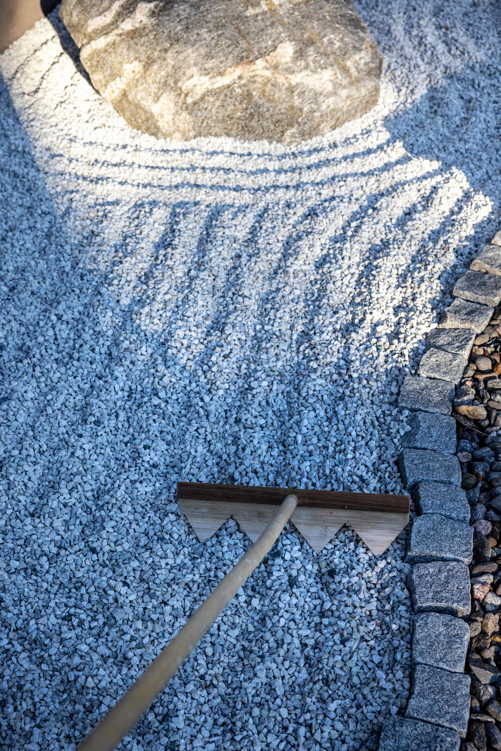 Waves raked into sand and gravel.