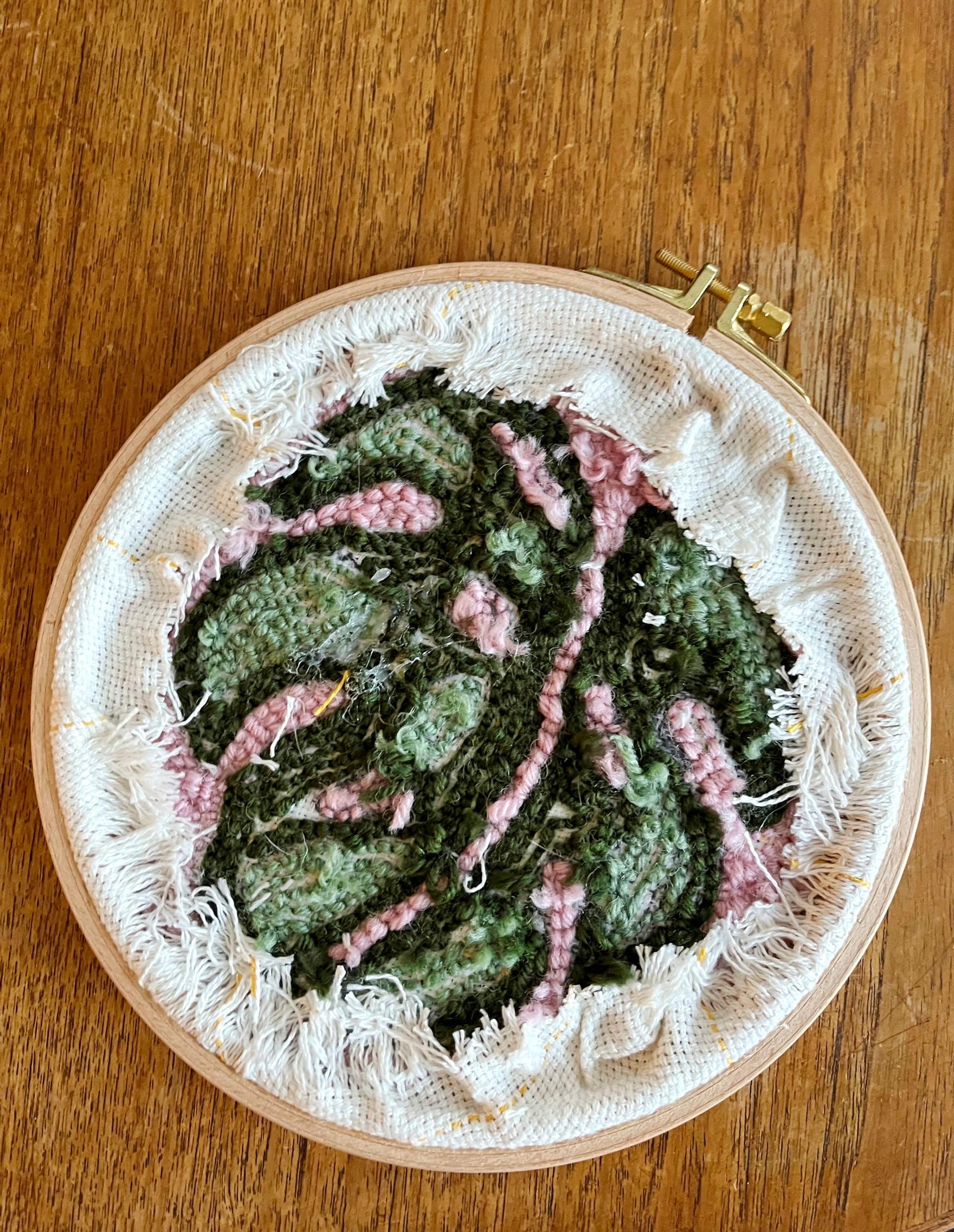 Reverse side of the tufted monstera wall hanging