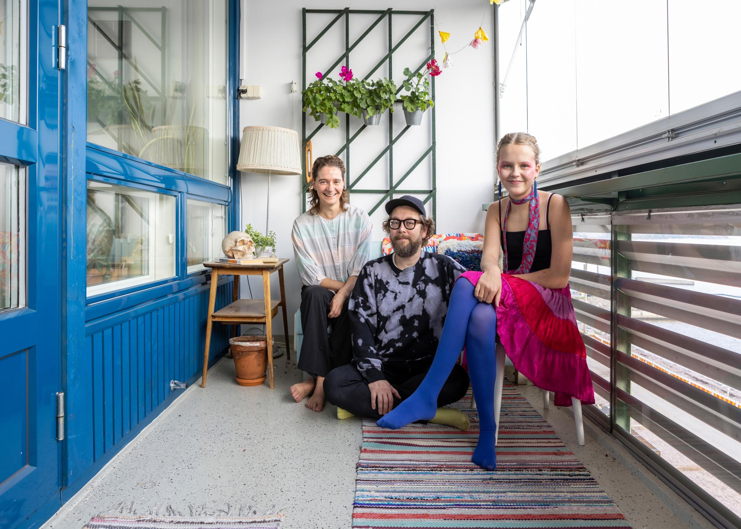 The family on their balcony in Merihaka