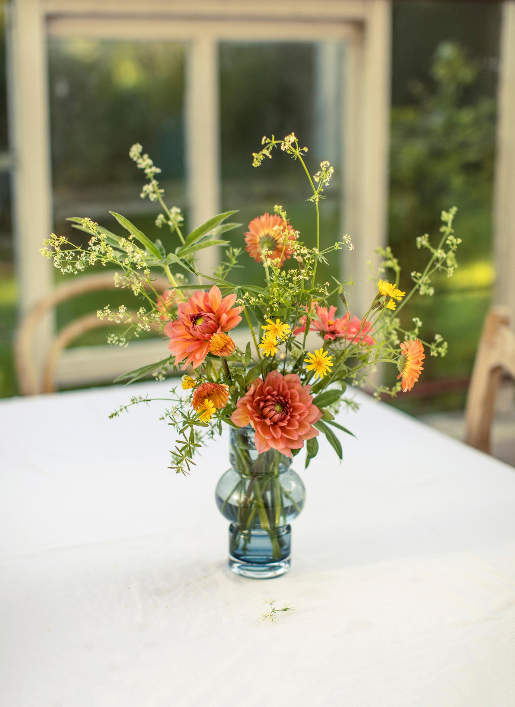 Garden and roadside plants, along with wilted flowers, shine in Kreetta Järvenpää’s arrangements—gather ideas