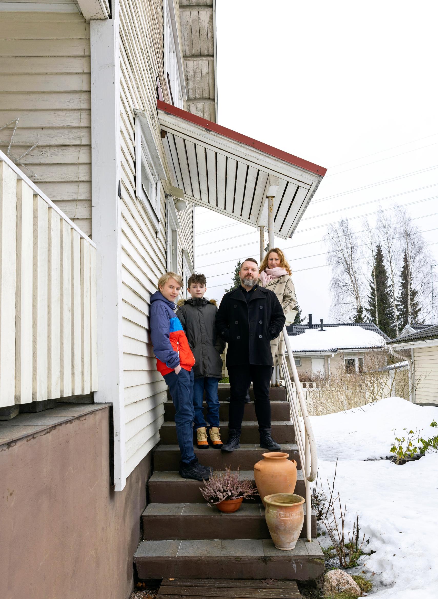 Cyrila Cibulka’s family on the steps of their home