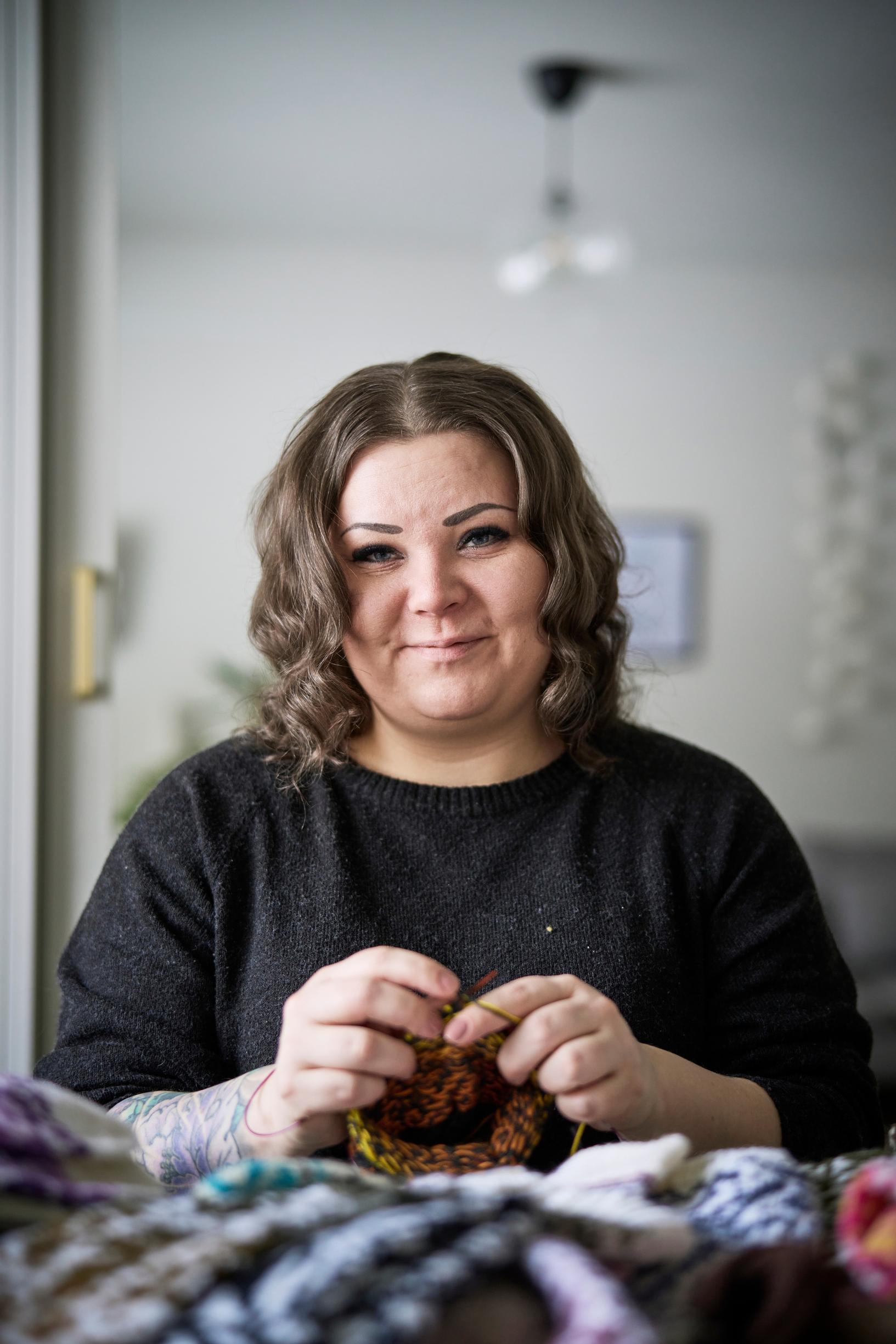 Niina Laitinen knitting a sock