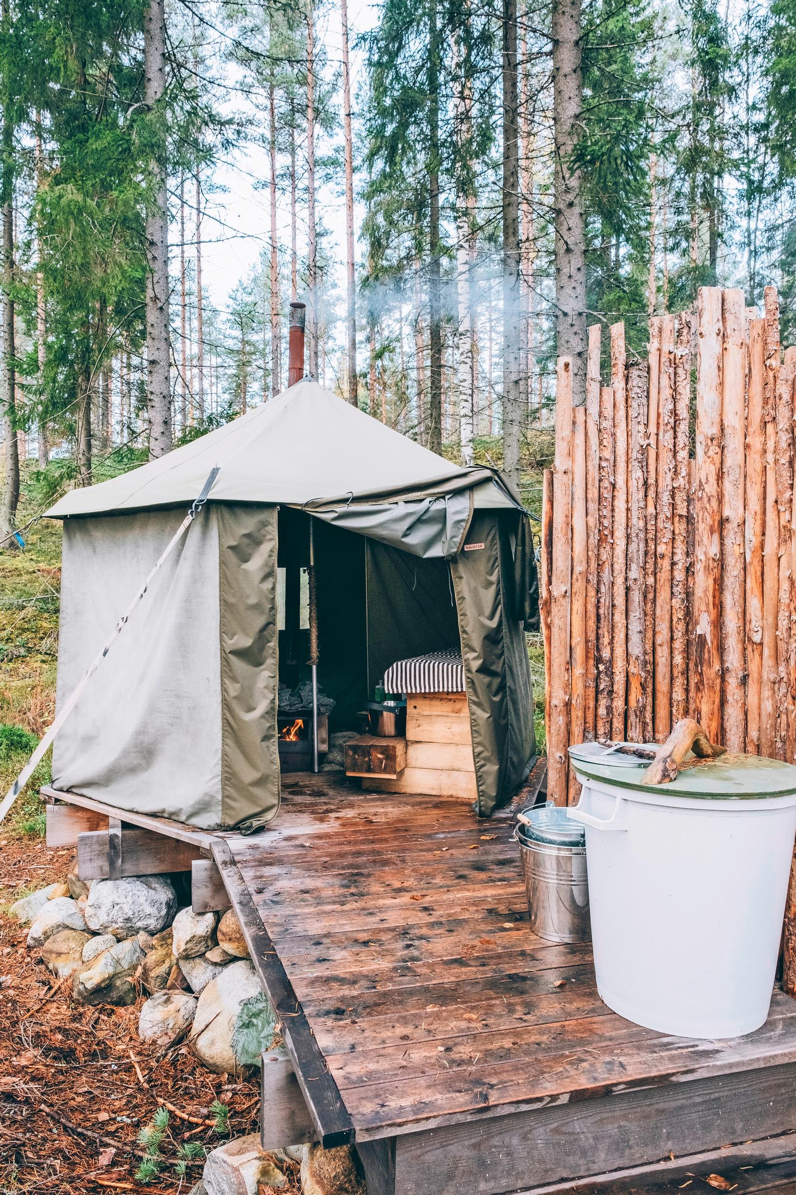 Bathing in the tent sauna