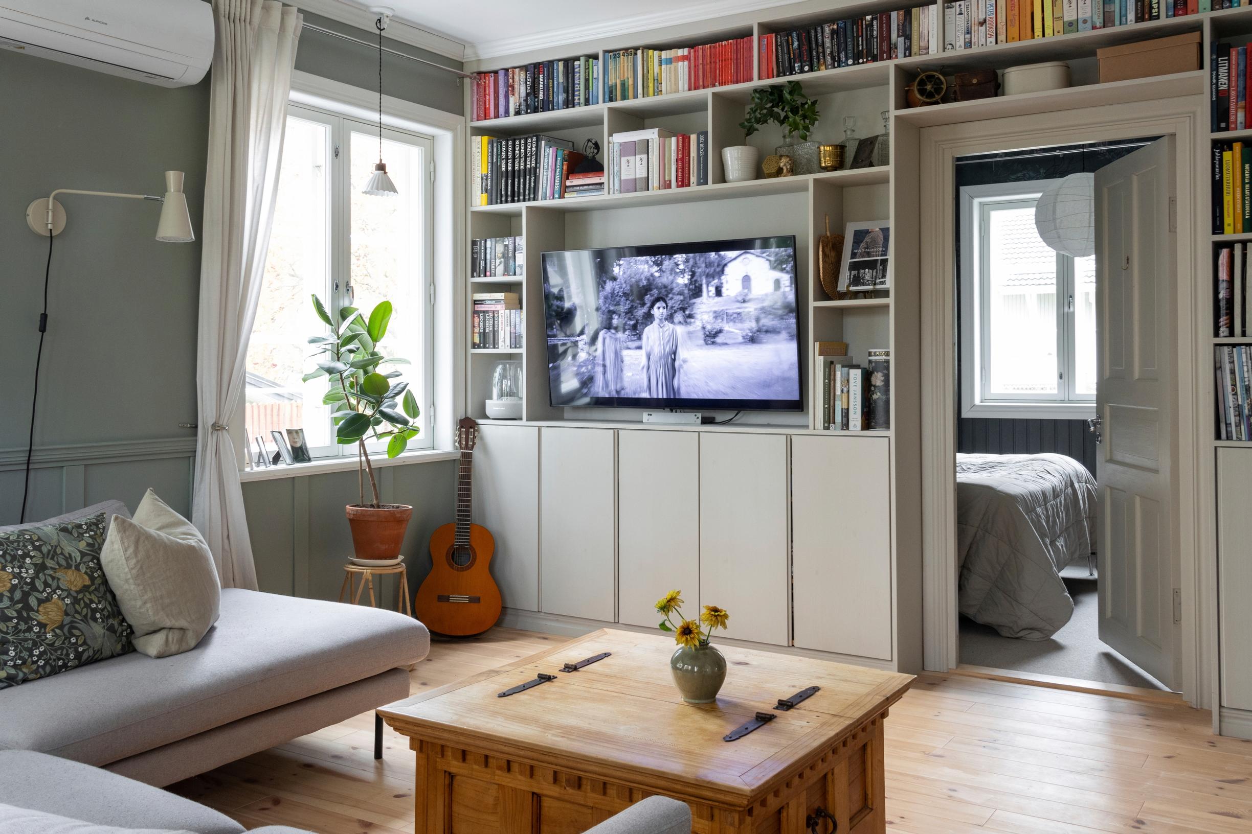 Picture of the living room and finished bookshelf.