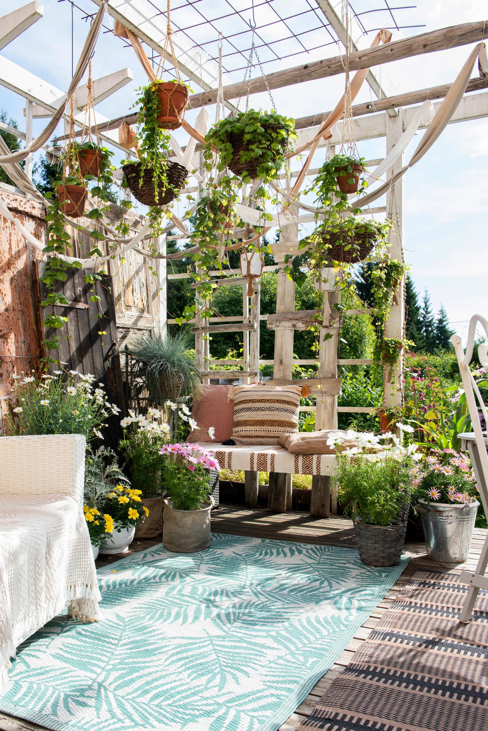 A sprawling labyrinth of creative grandiosity! Asta’s half-acre garden in Eastern Finland is built affordably and with recycled materials