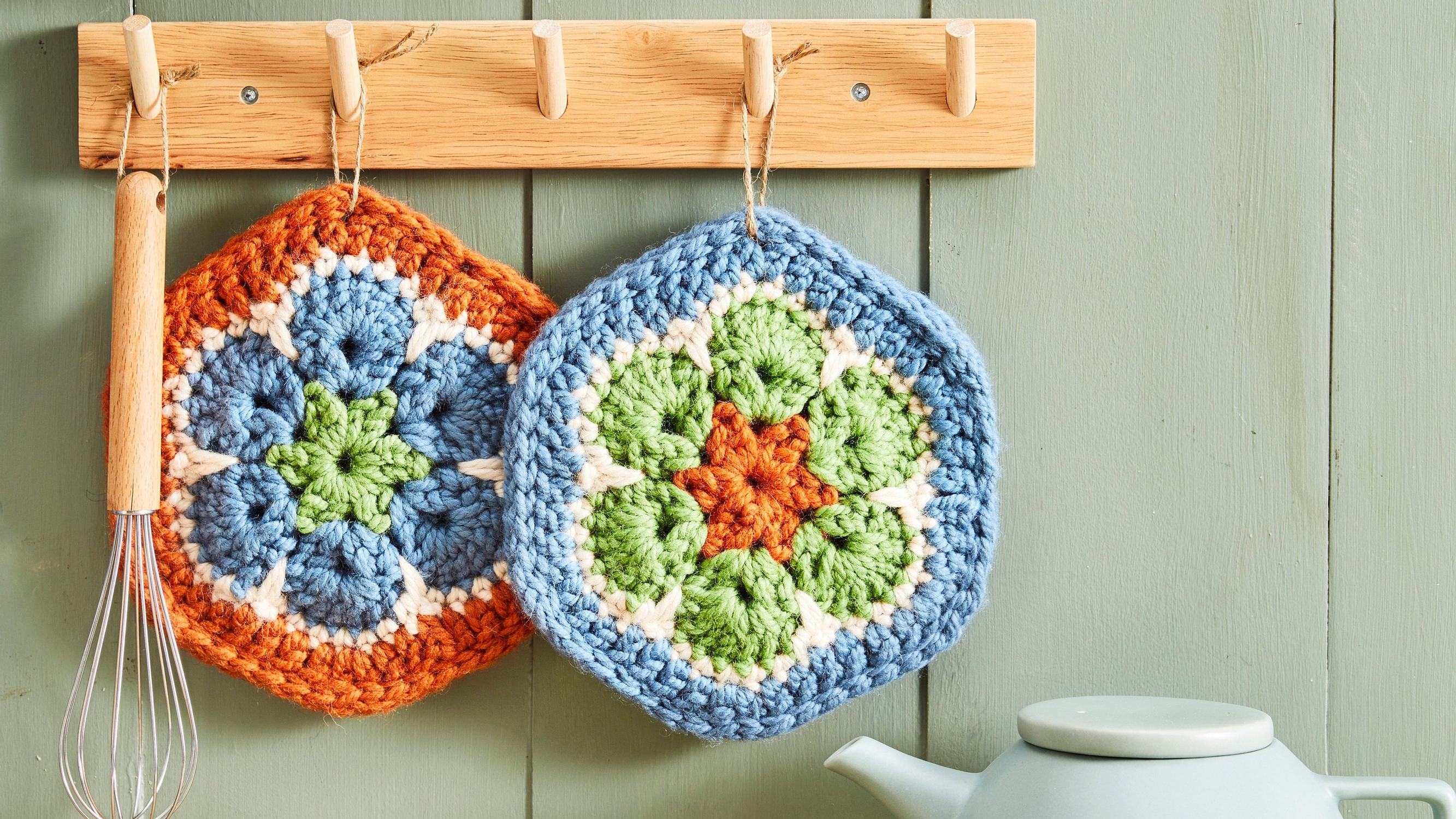 Make your kitchen bloom with these colorful crocheted African flower potholders!
