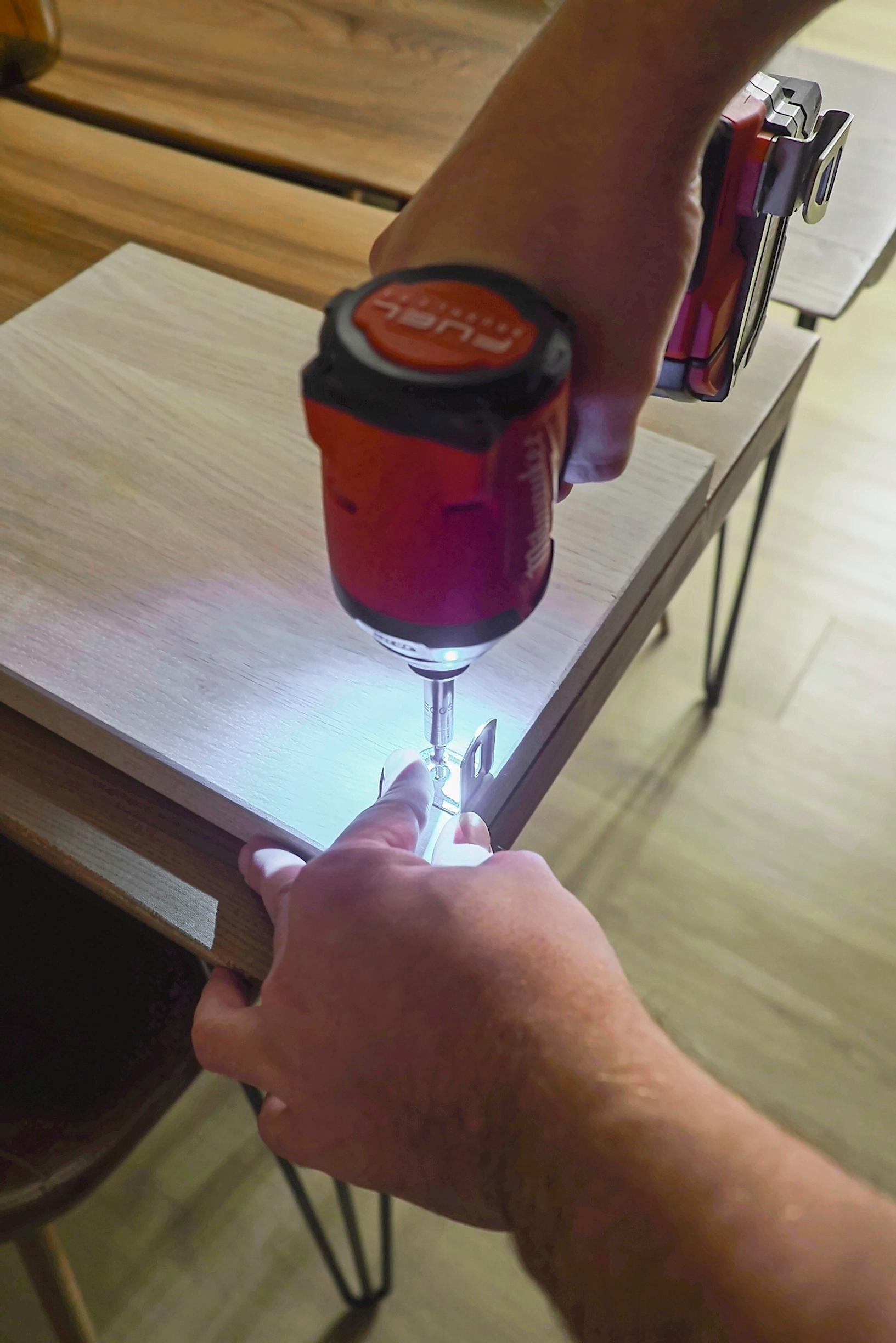 Attaching a corner brace to the bench leg