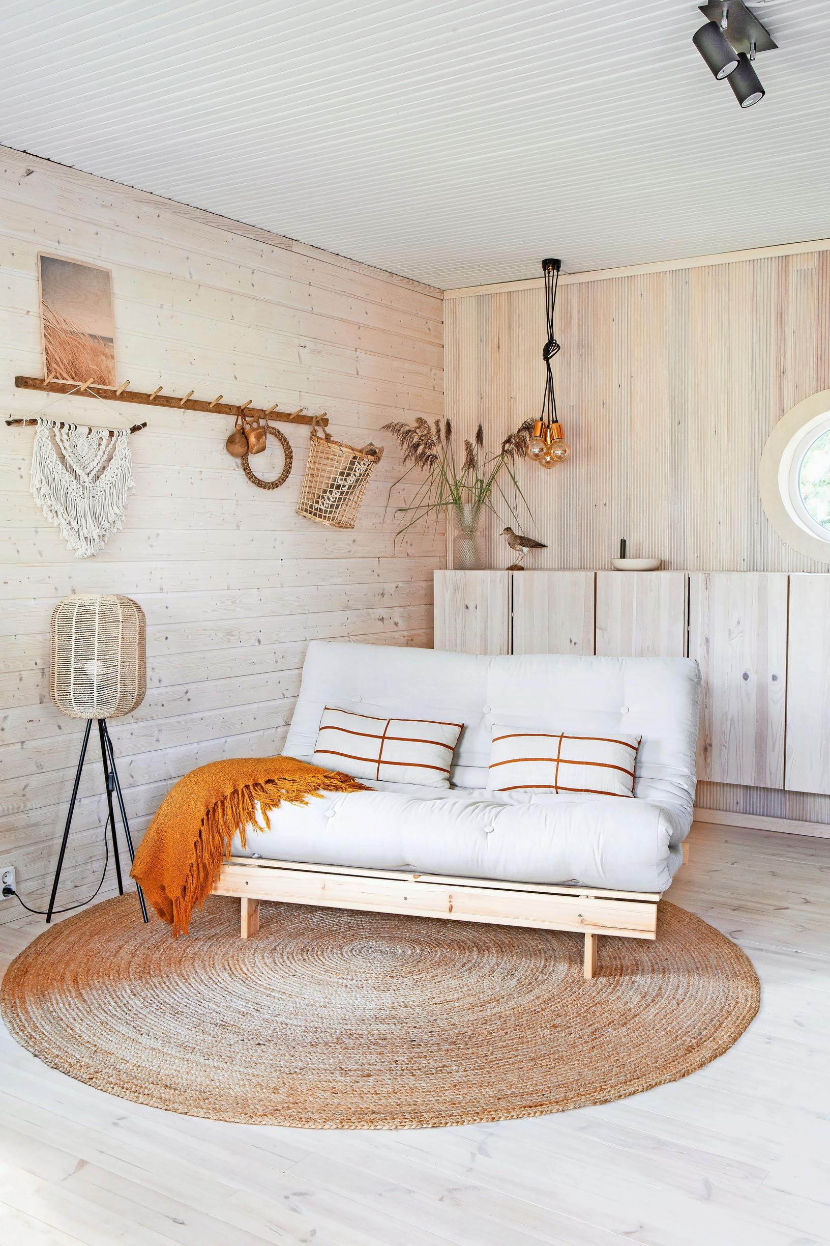 Guest room: Two-person futon sofa in a paneled space