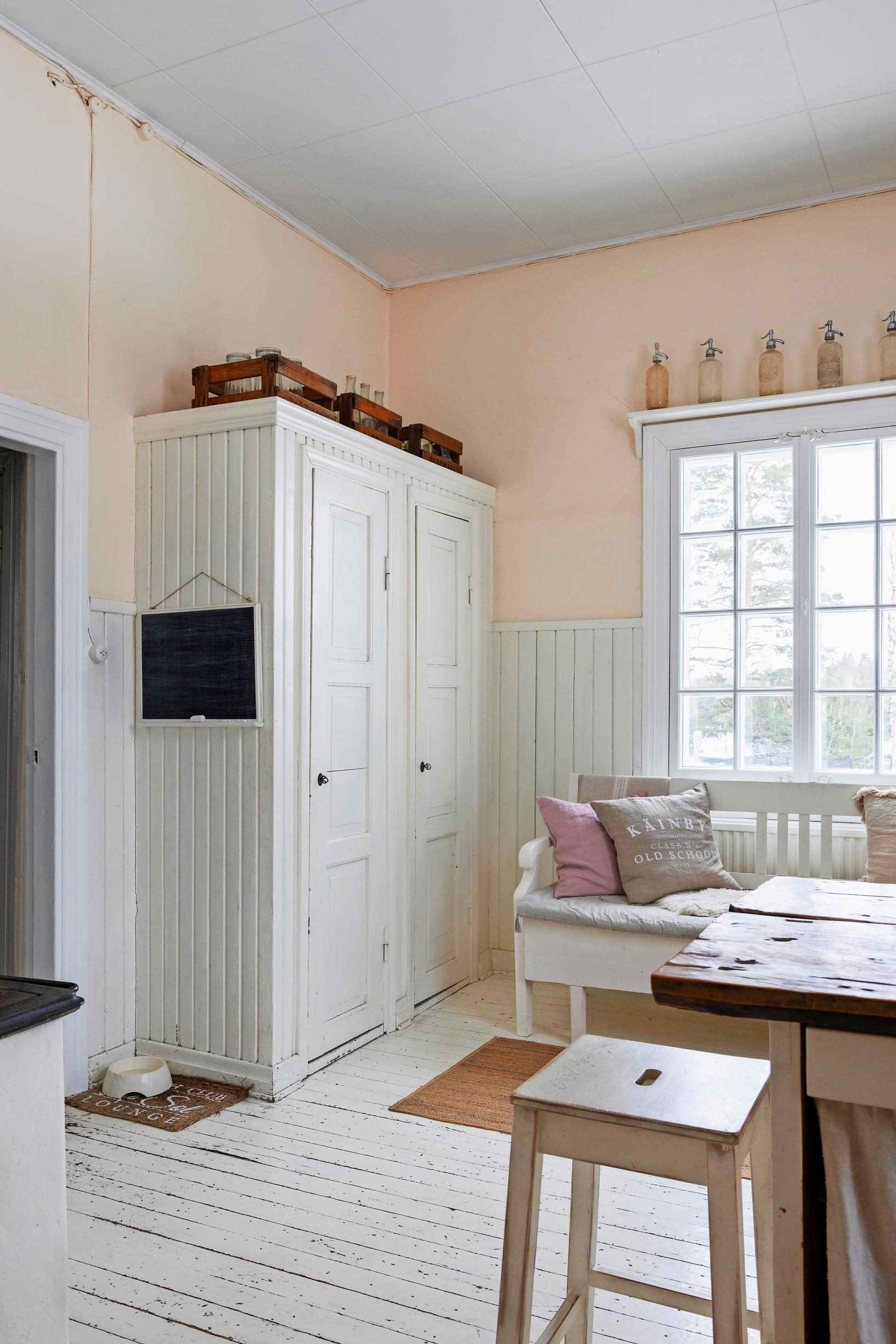 A kitchen featuring an old cabinet