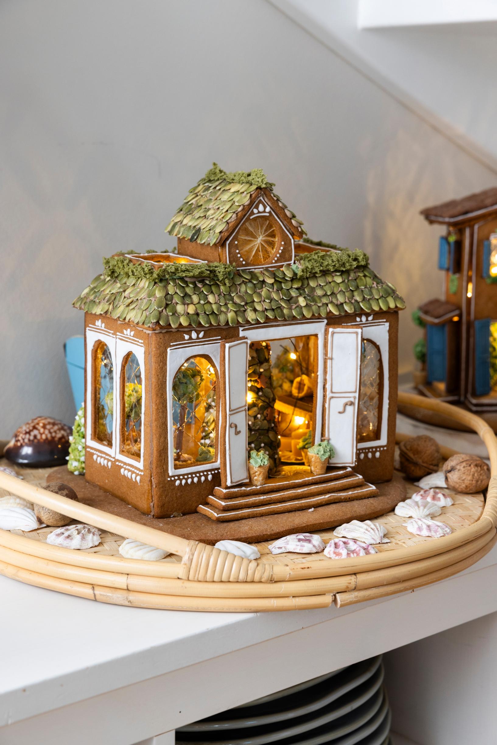 A gingerbread greenhouse with an edible moss roof.