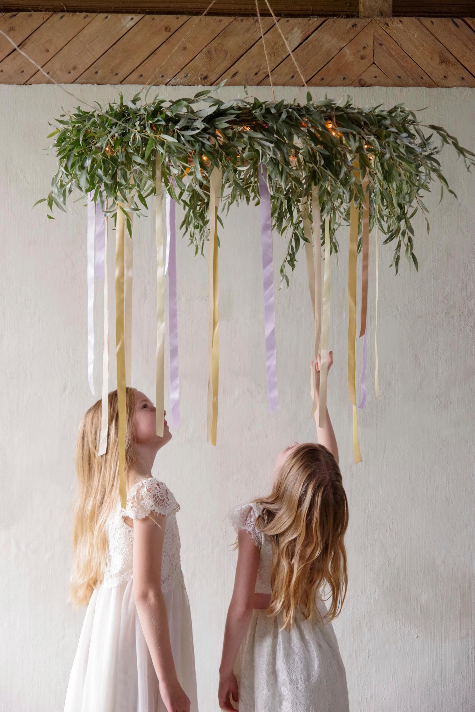 Children under the canopy.