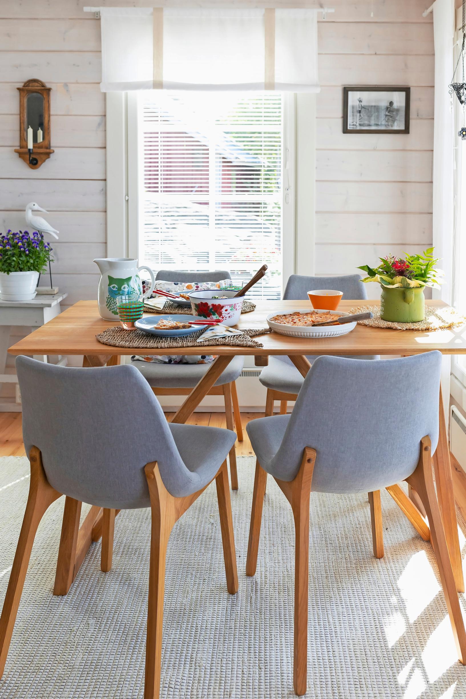 a dining set and a window