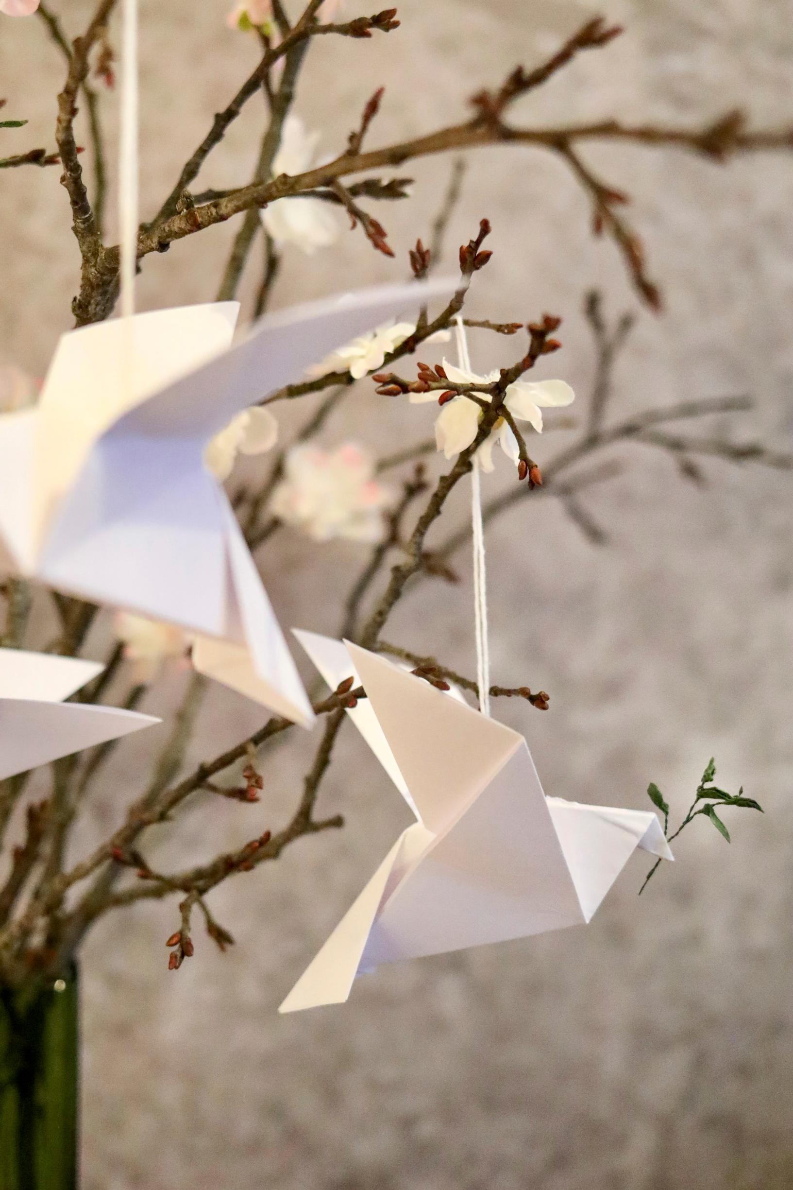 Origami dove with olive branch