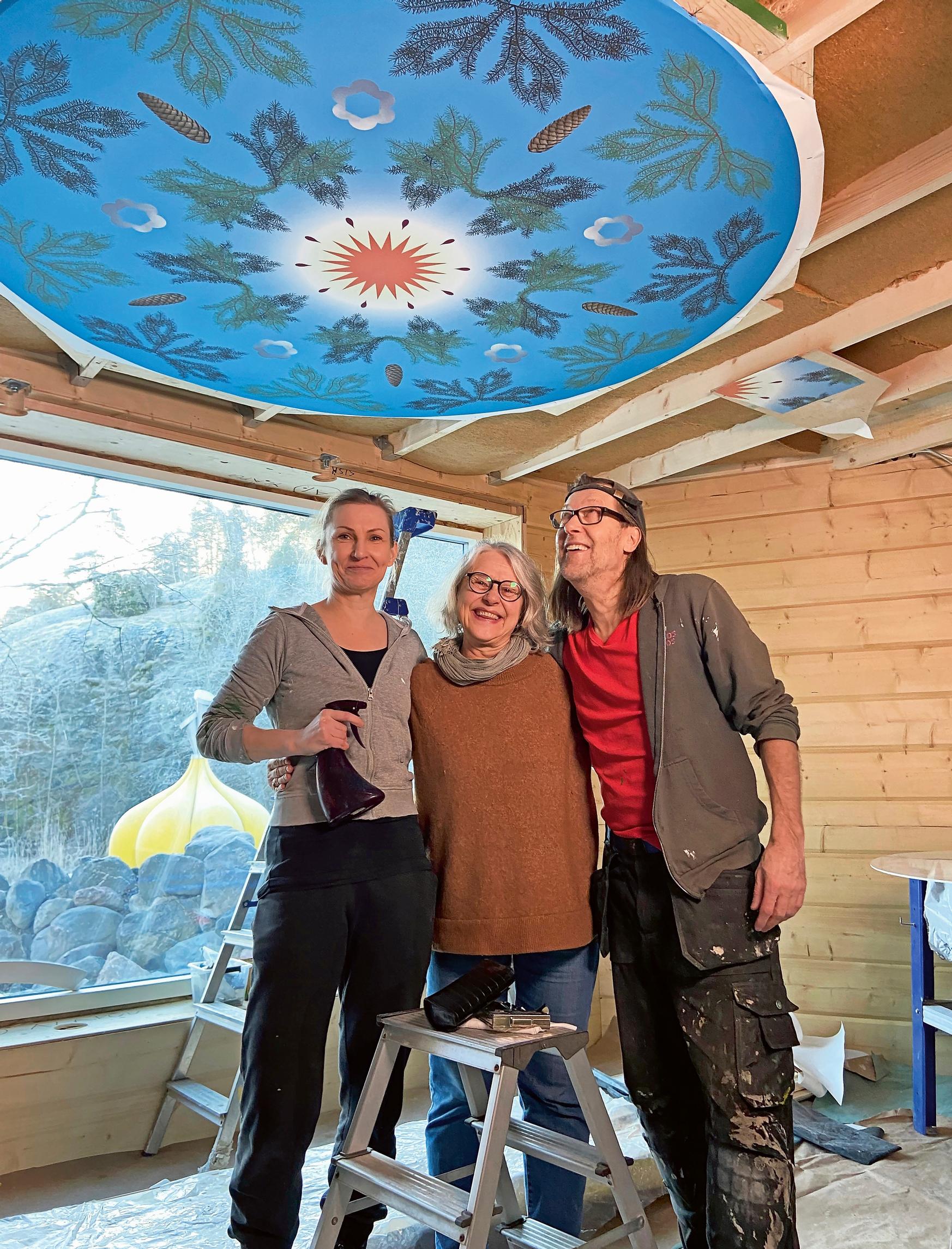 Jan-Erik, Marjo, and the neighbor who helped mount the piece