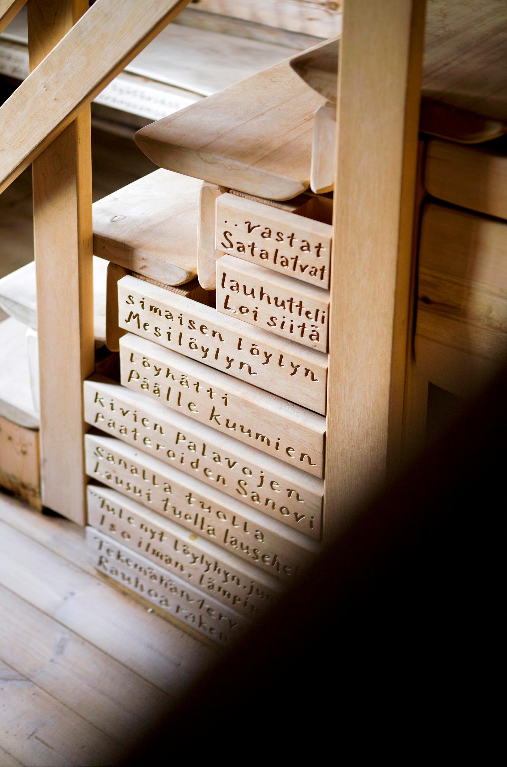 Engraved text on the sauna steps