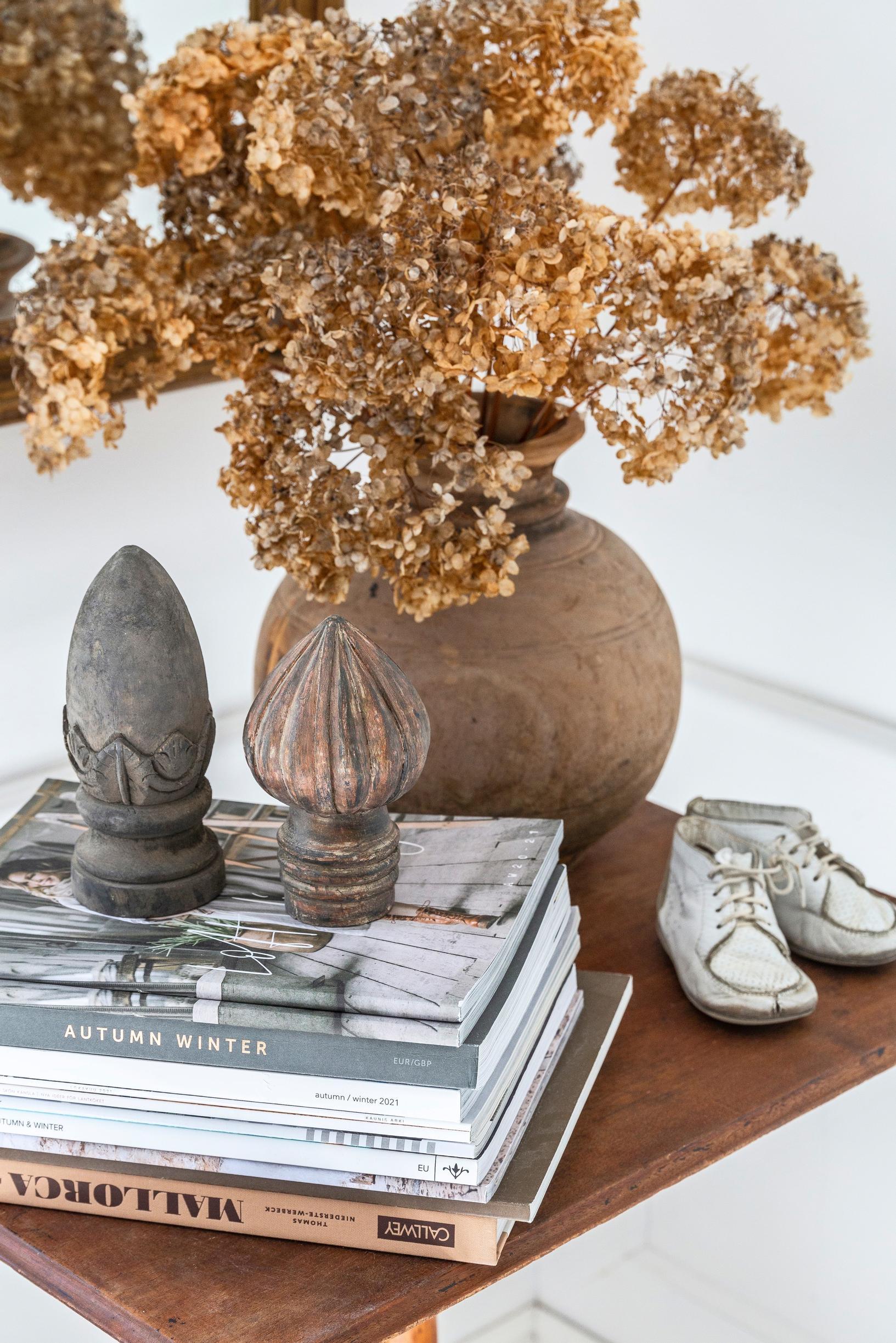 Books and lifestyle magazines artfully arranged