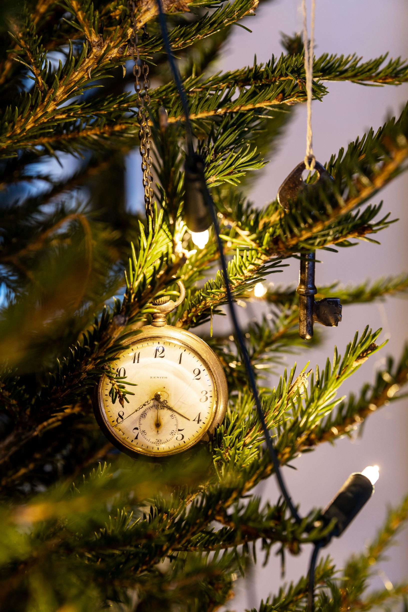 A pocket watch decorates the Christmas tree