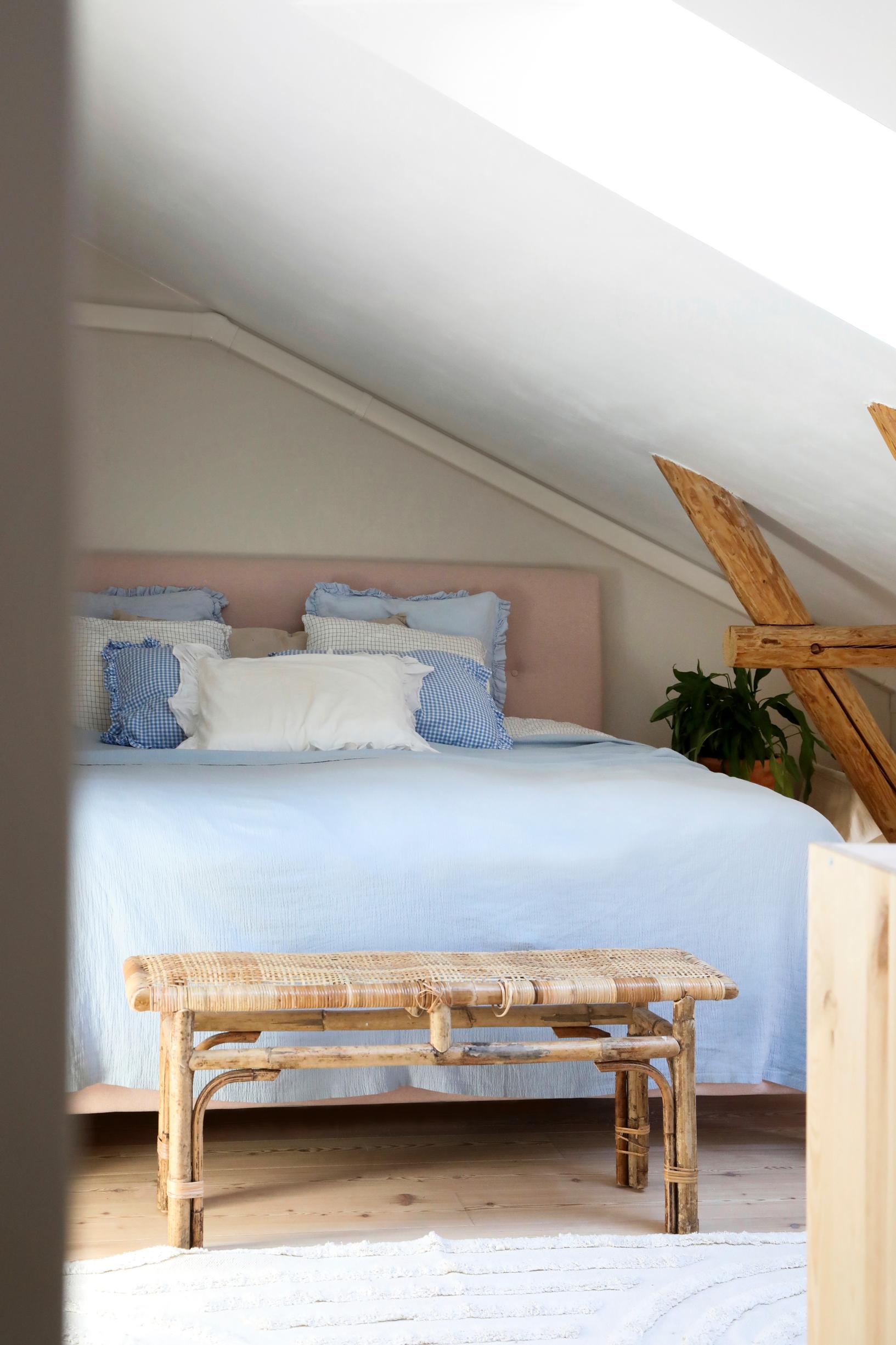 bedroom with a light blue bedspread