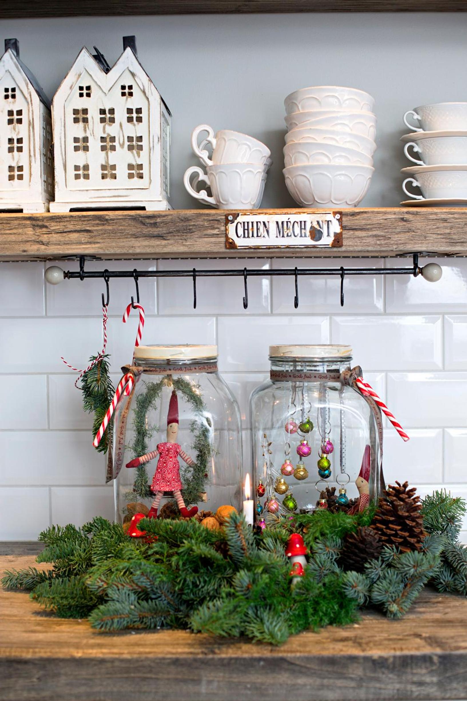 A playful Christmas display made from two glass jars