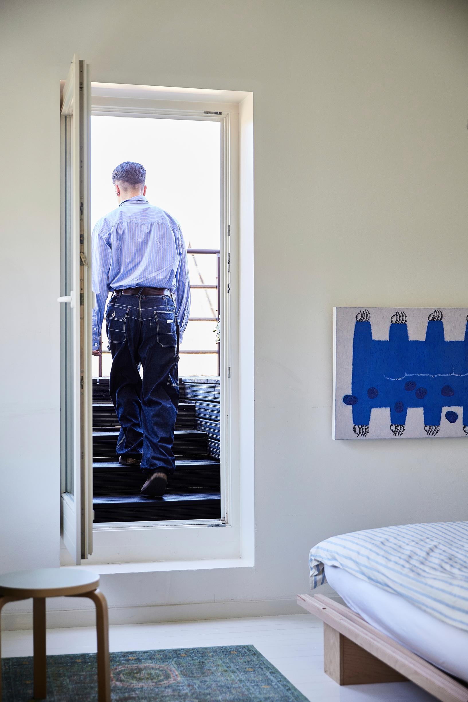 The rooftop terrace is accessed from the bedroom.