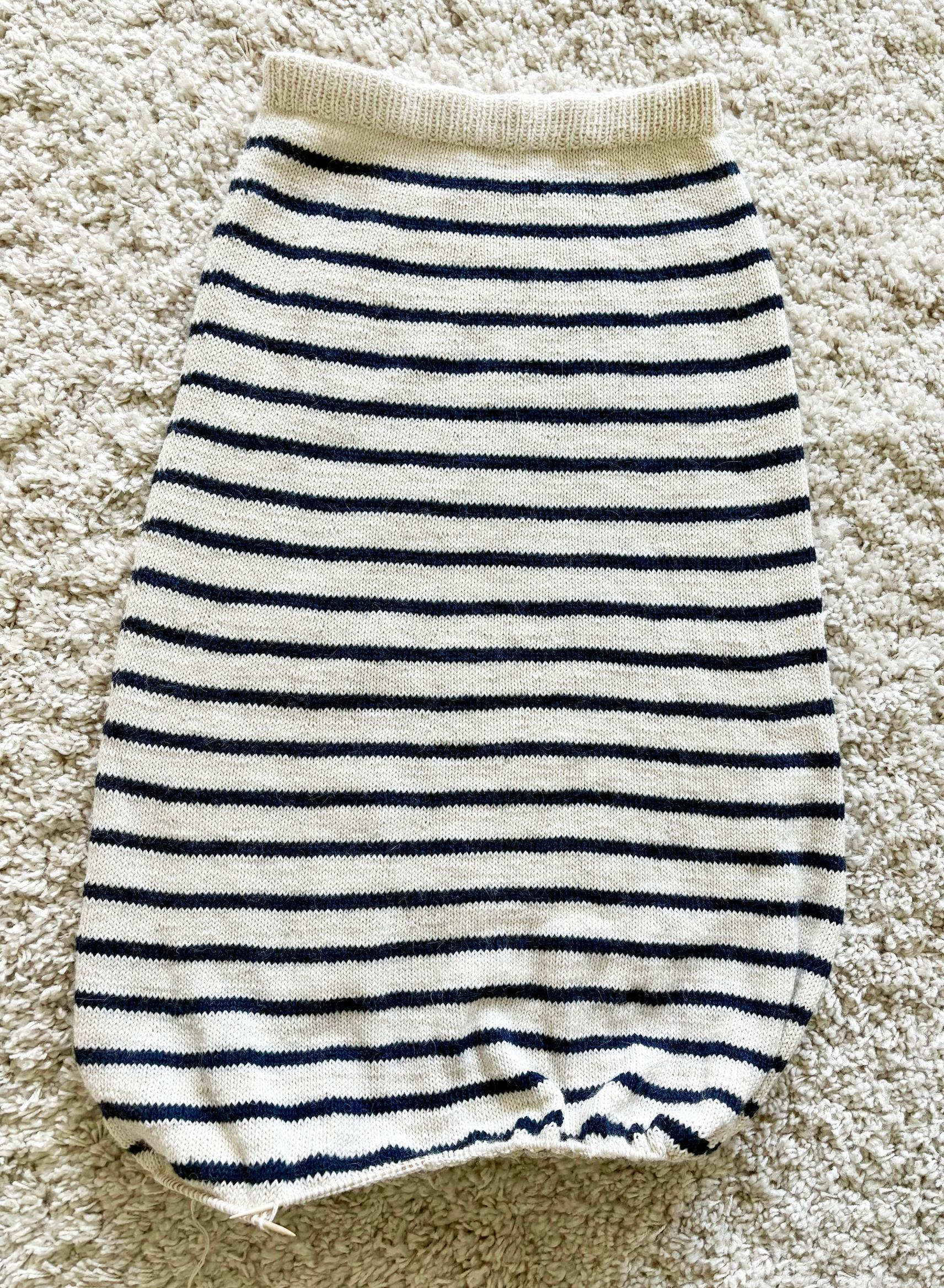 An unfinished striped skirt
