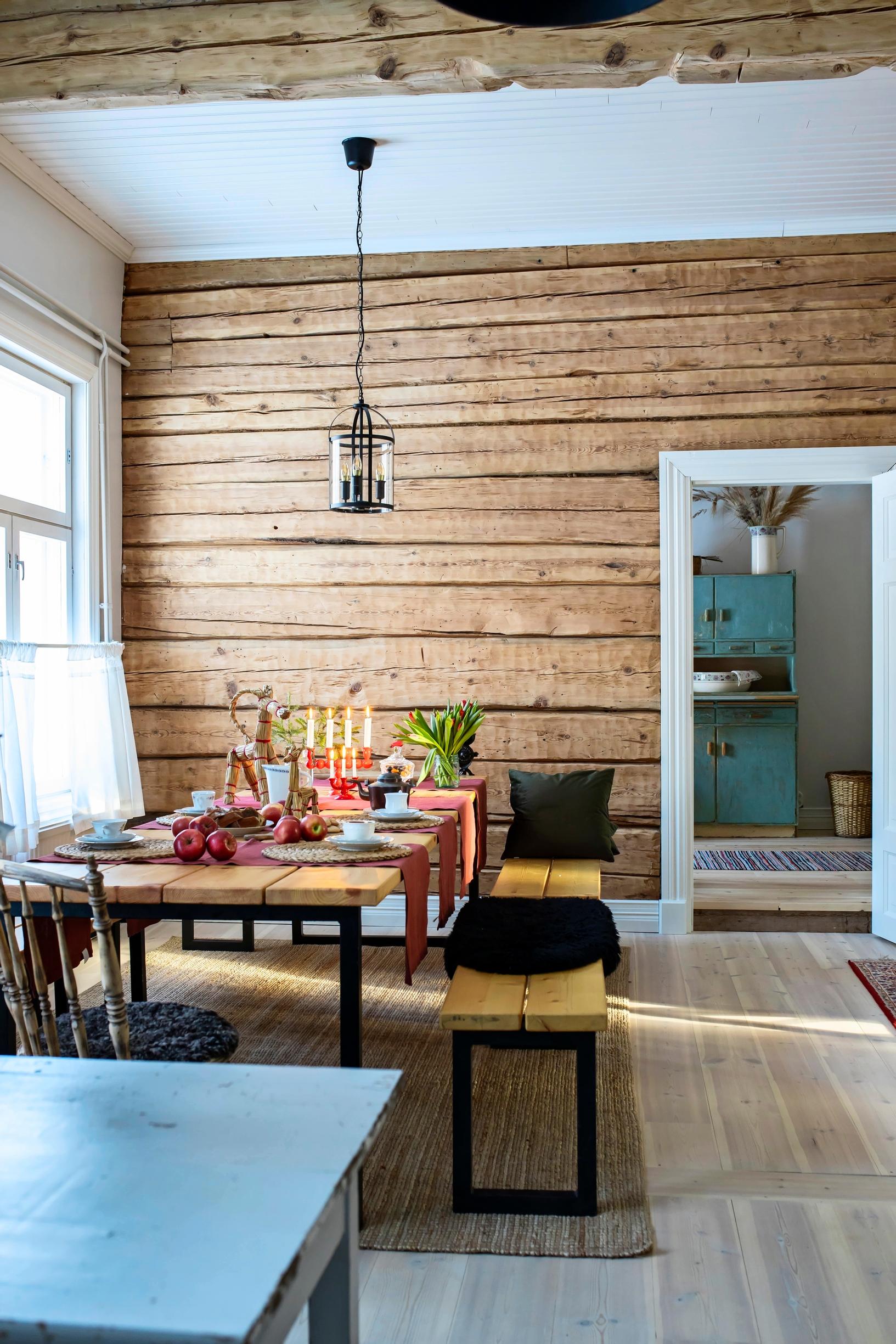 Restored log walls in the vicarage’s everyday kitchen