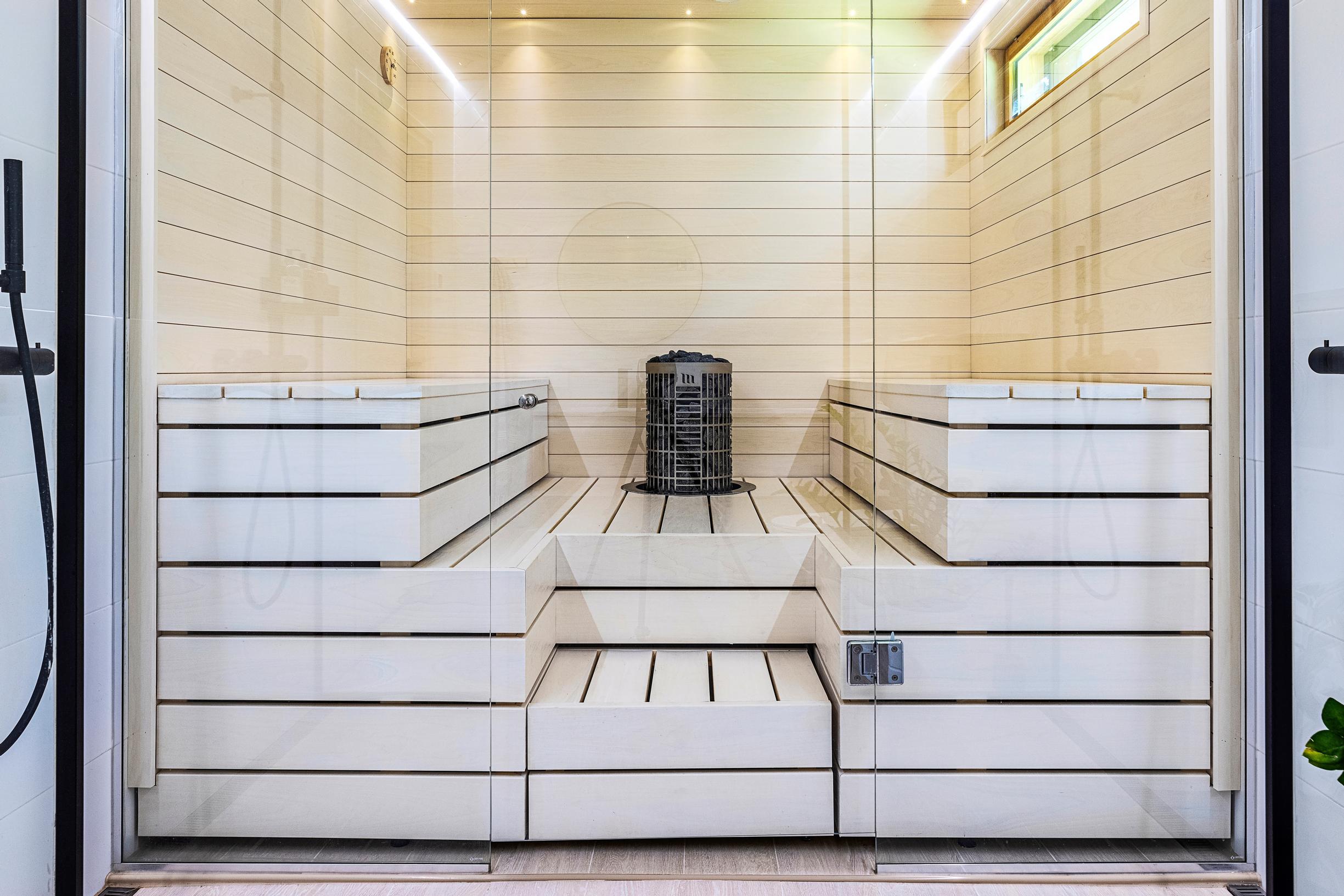 Benches fully clad down to the floor in the sauna