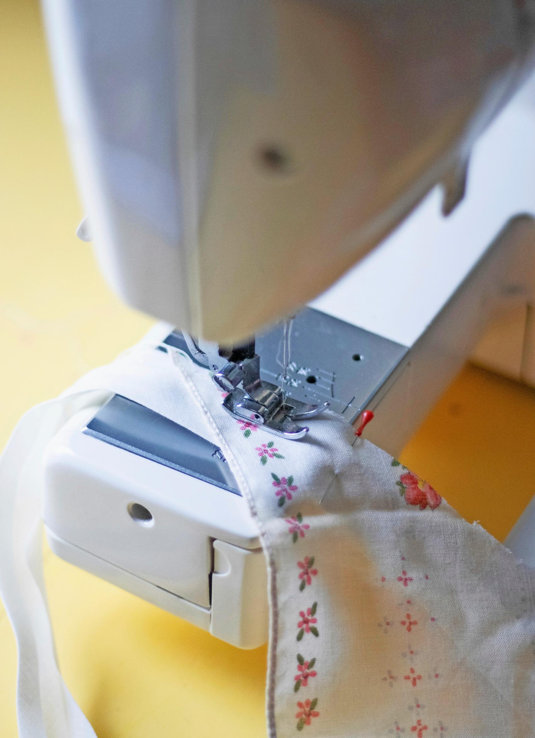 Sewing the bunting