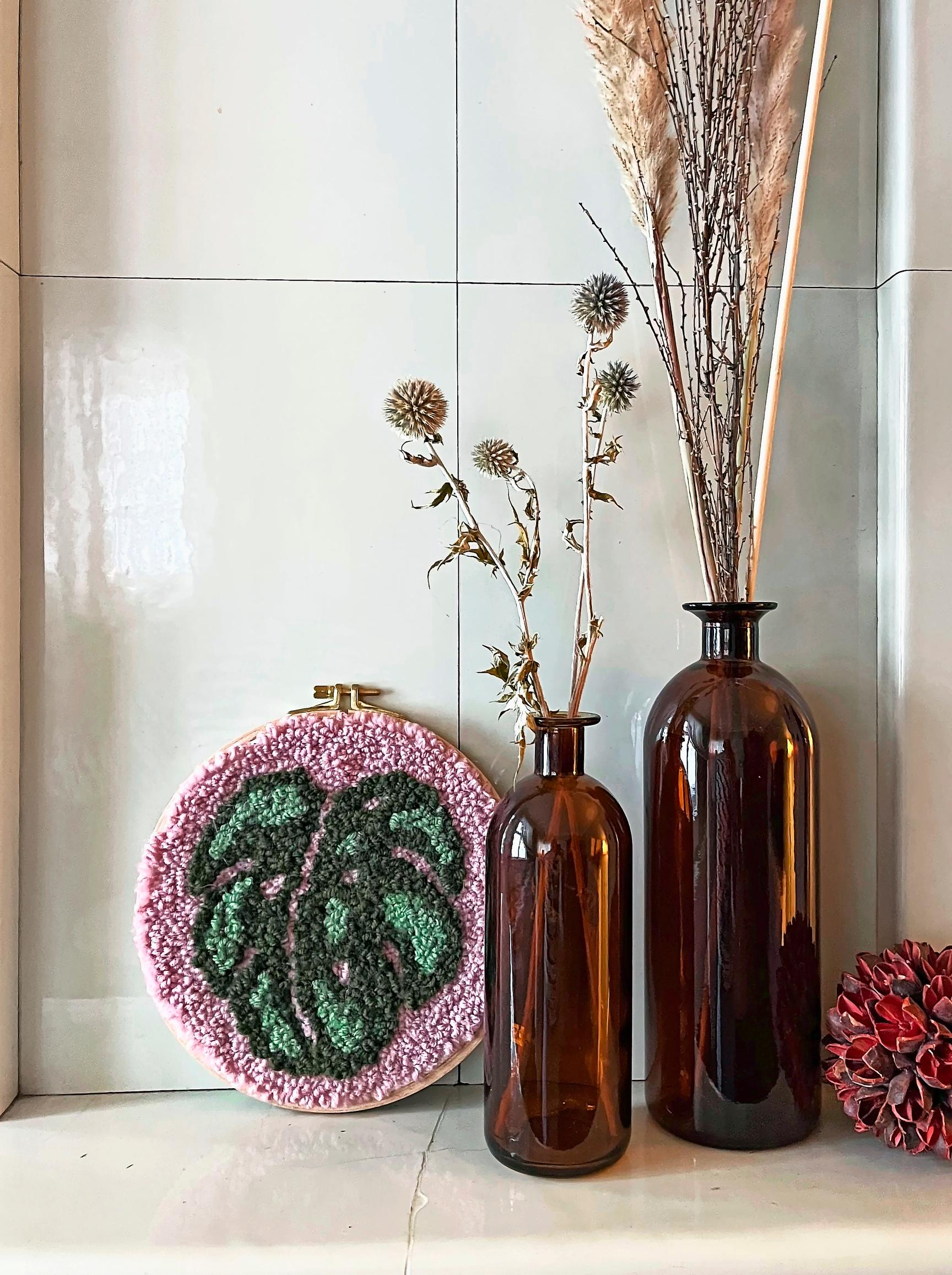 Finished tufted monstera wall hanging