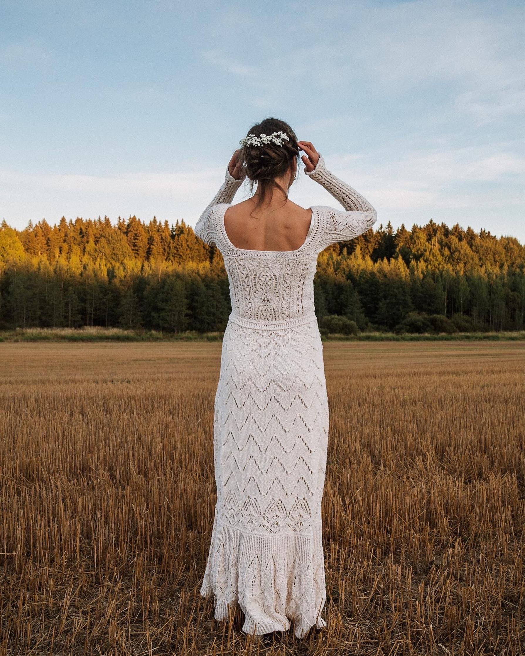 Veronika Lindberg in her knitted wedding dress, photographed from behind