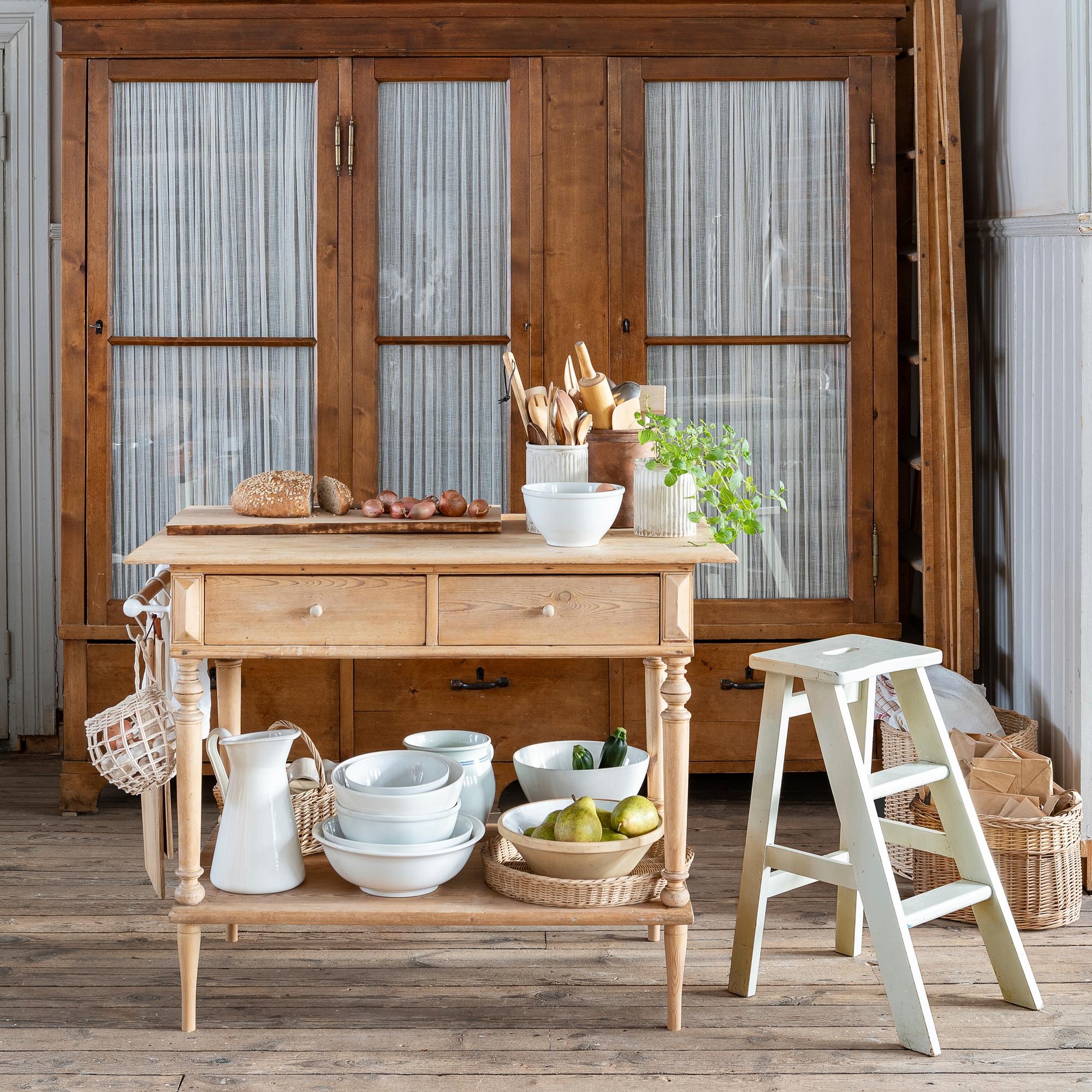Kitchen island from an old table! See instructions for the handy side table made from recycled parts