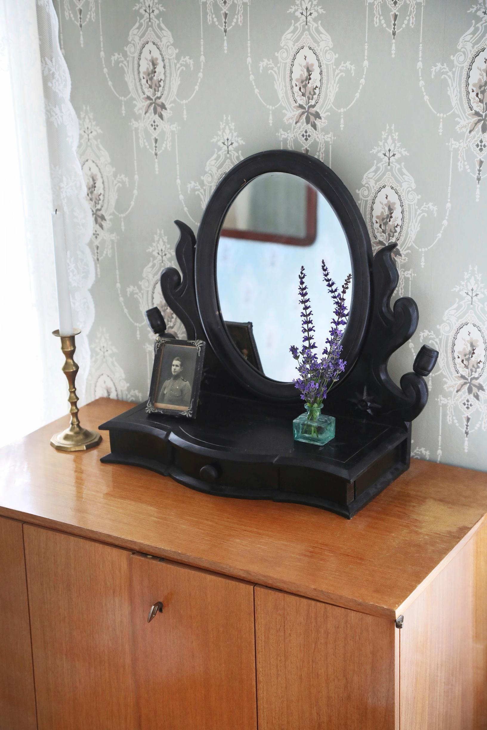 Vanity mirror on top of the cabinet