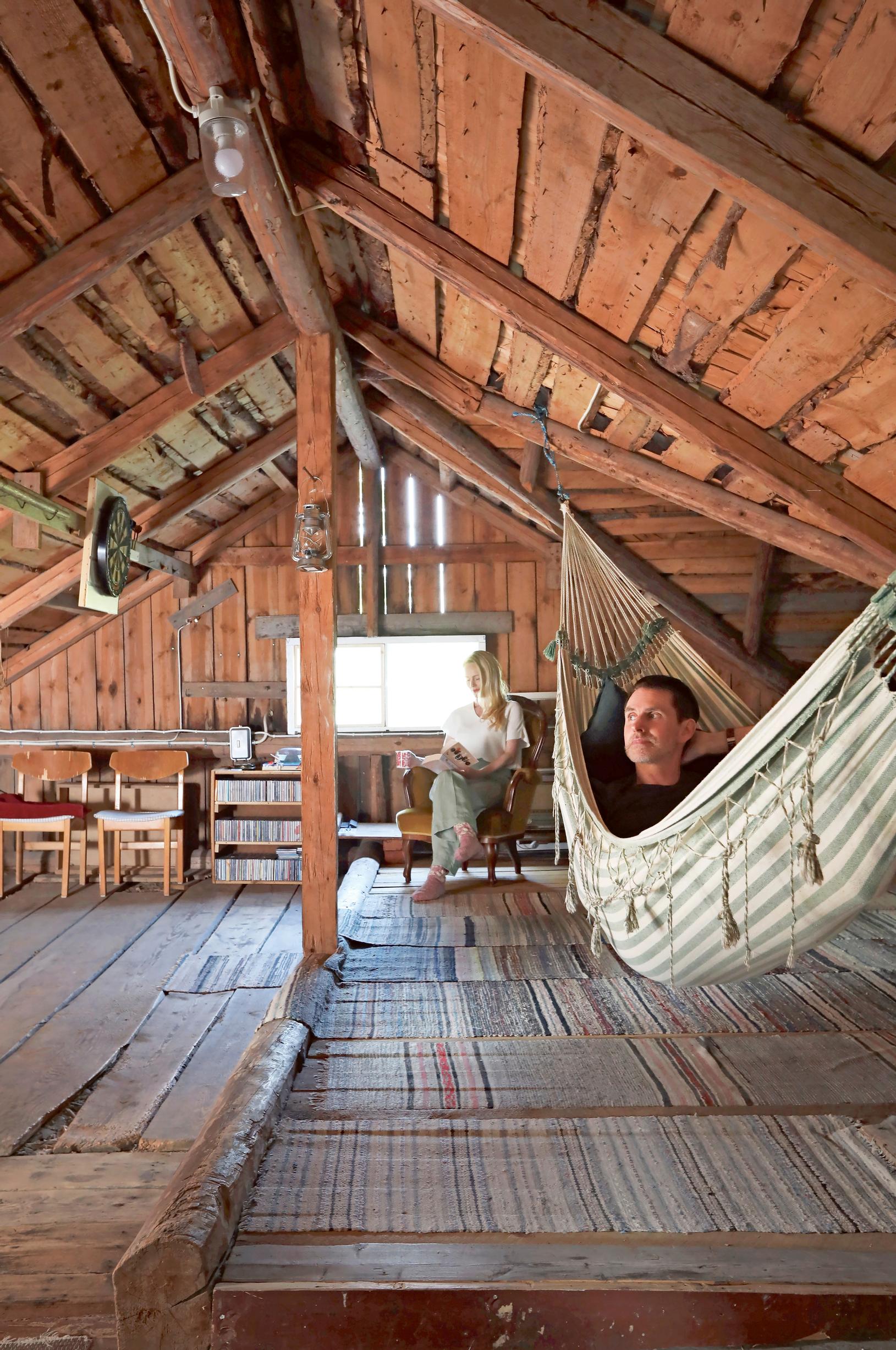 Jutta and Sami Helenius in the cottage attic