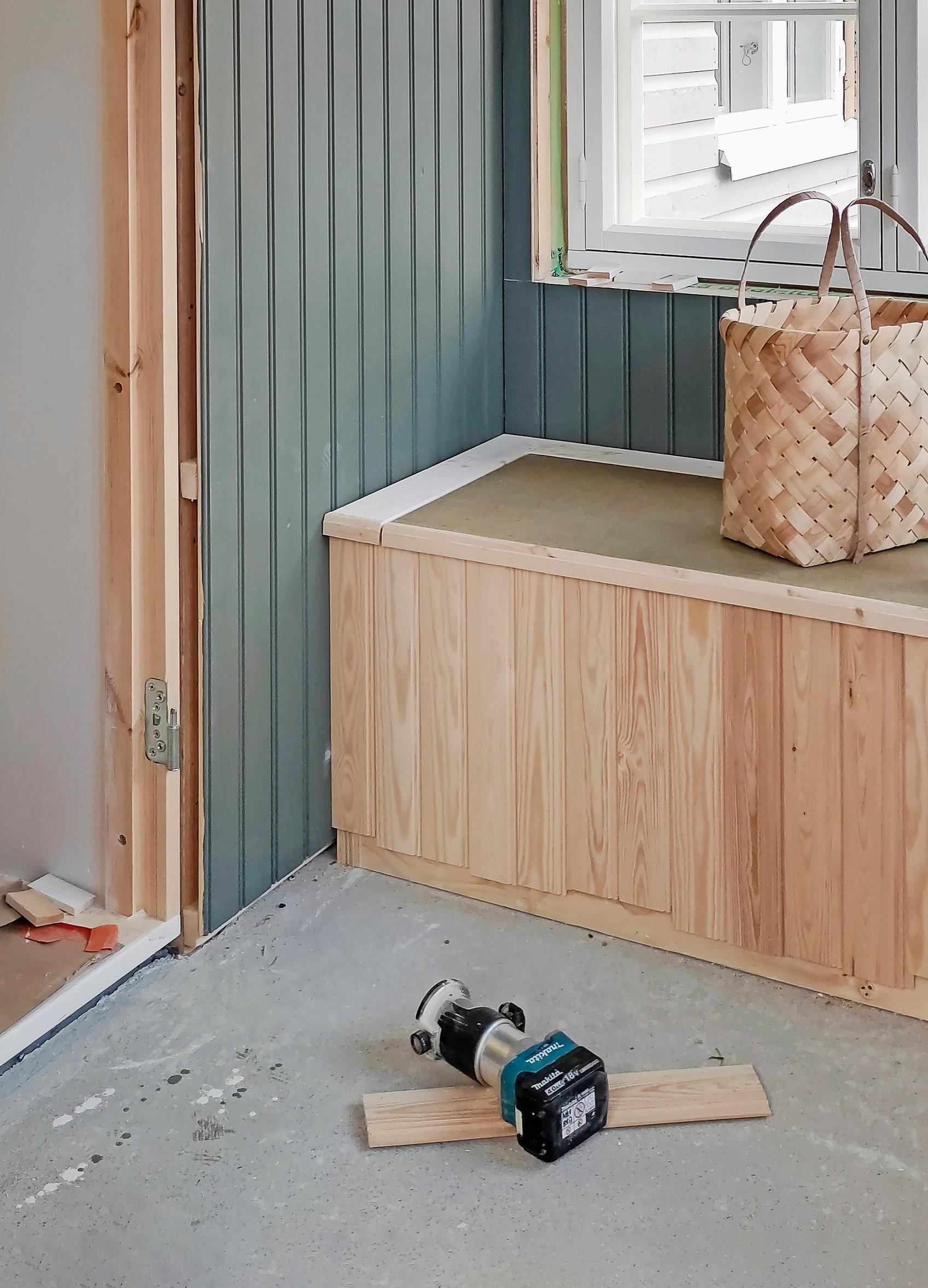 Photo of the unfinished built-in entry bench.