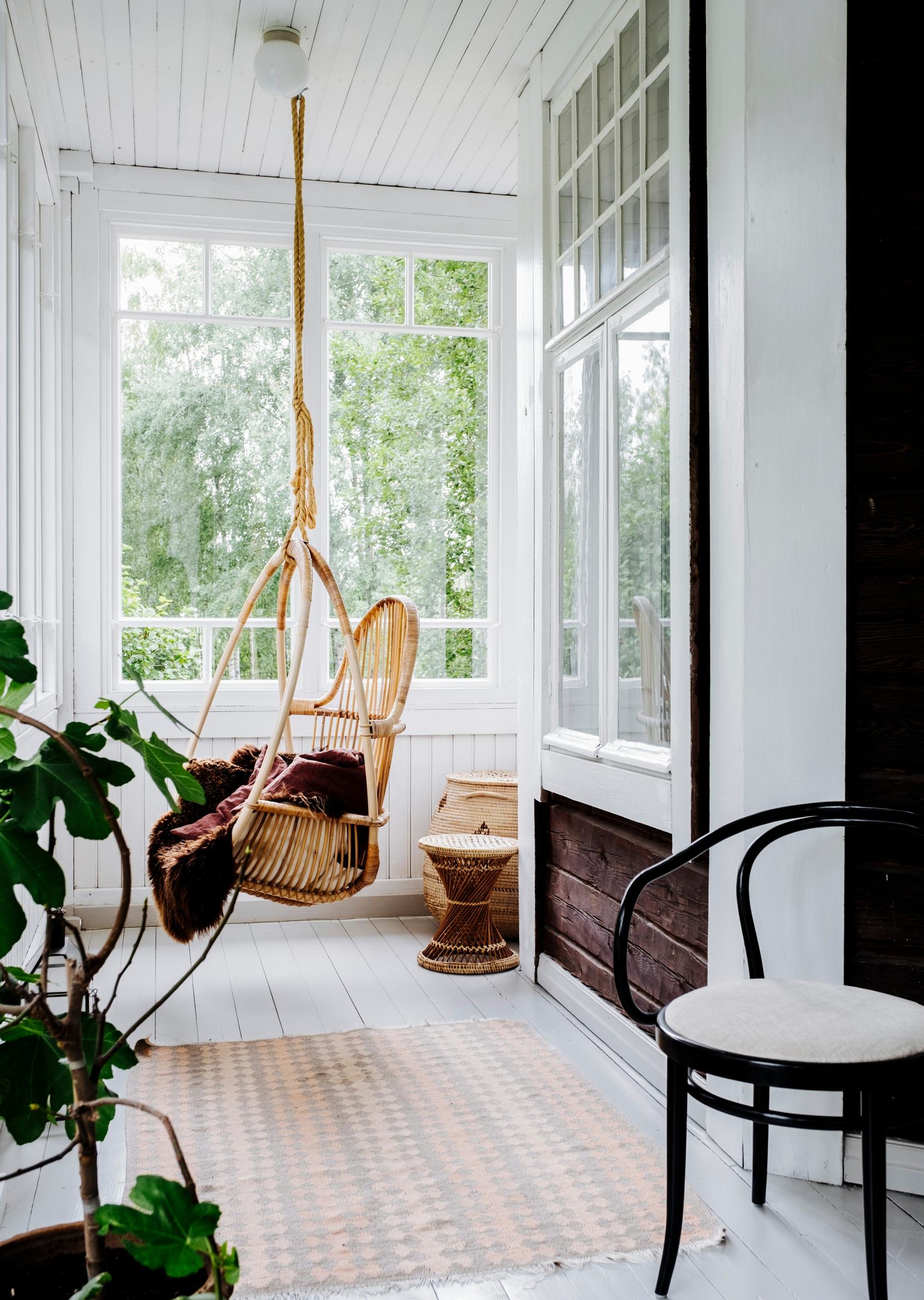 The impractical open porch was enclosed with glass.