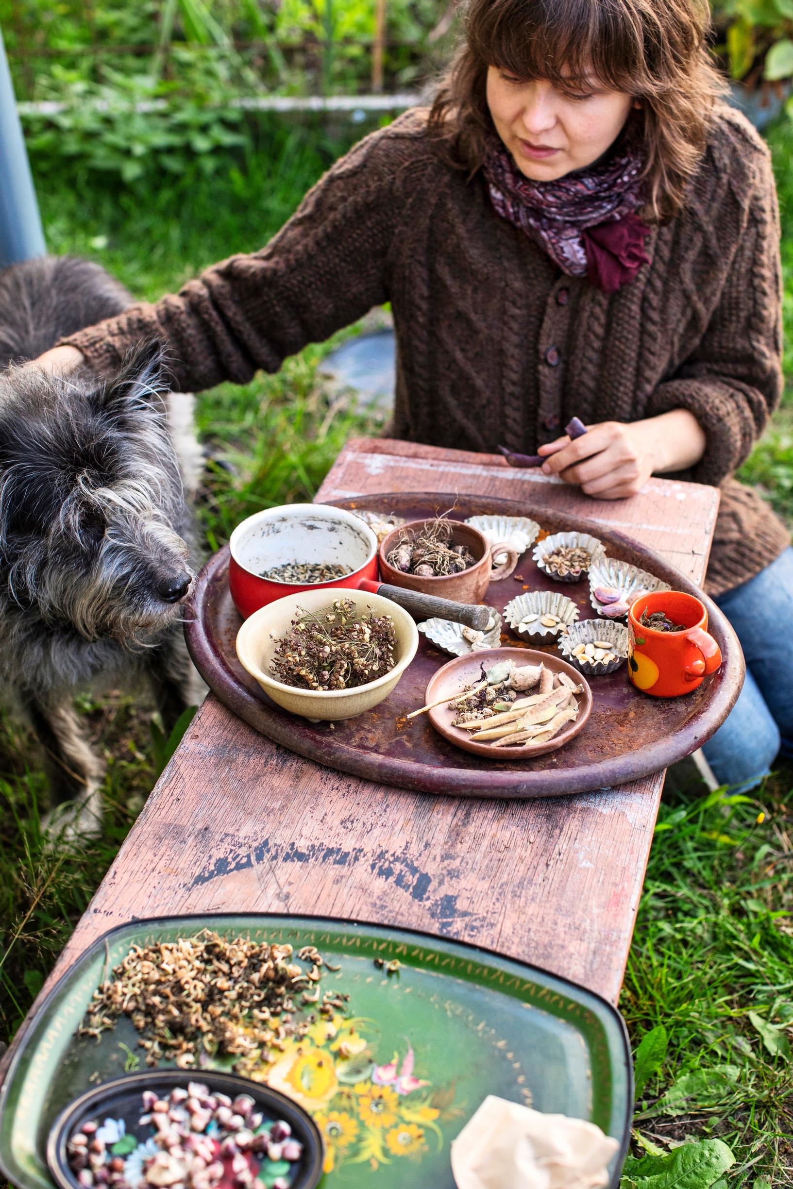 Stella Karlsson and Fantan the dog at a table