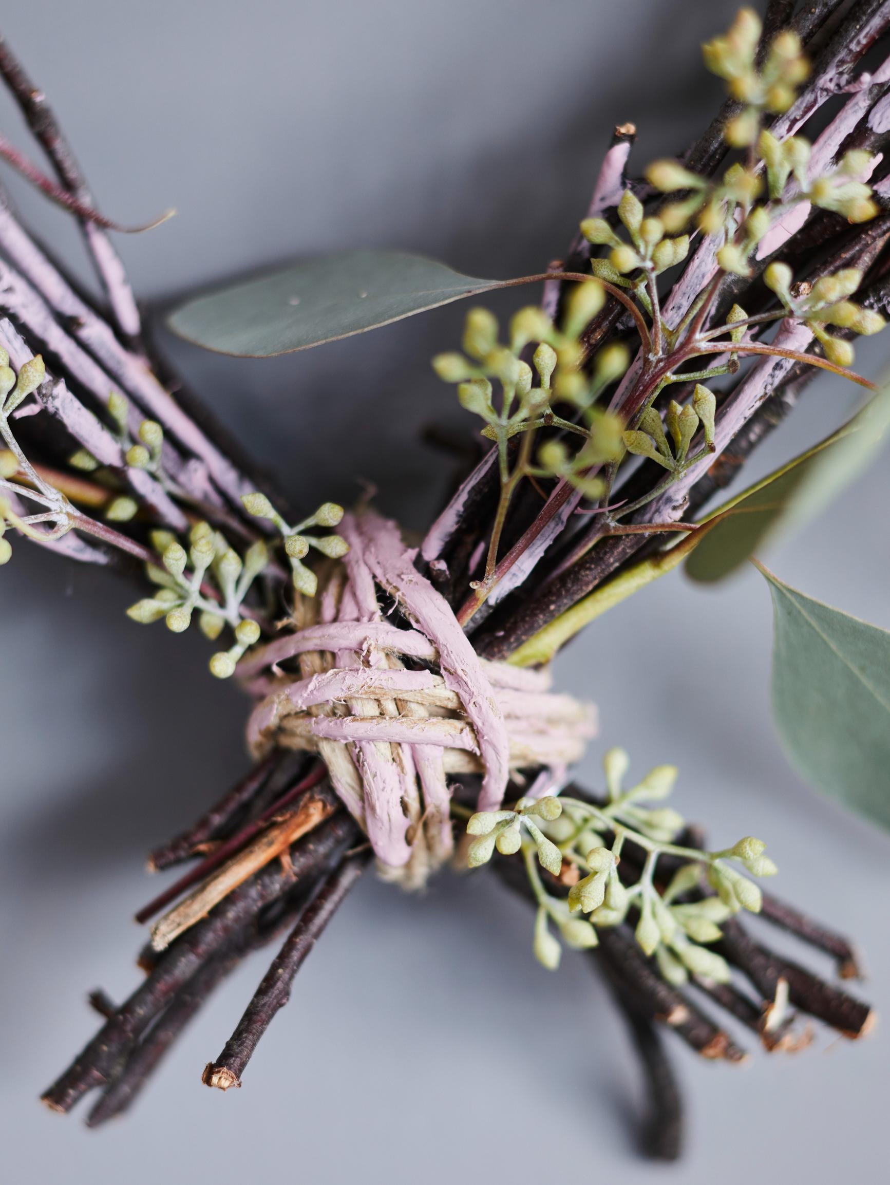 Heart-shaped twig wreath with cord concealing wire