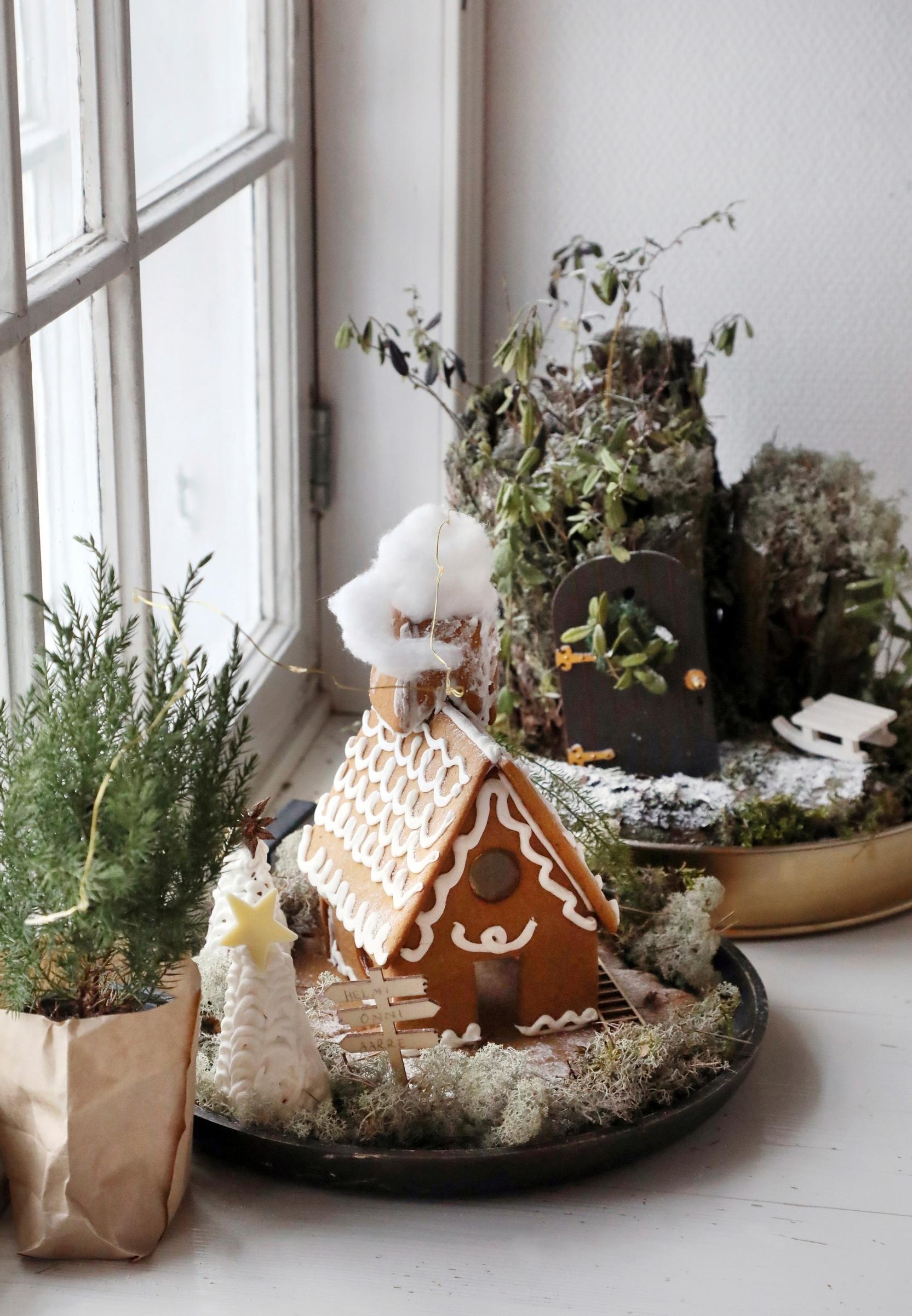 A gingerbread cottage resembling a summer cabin