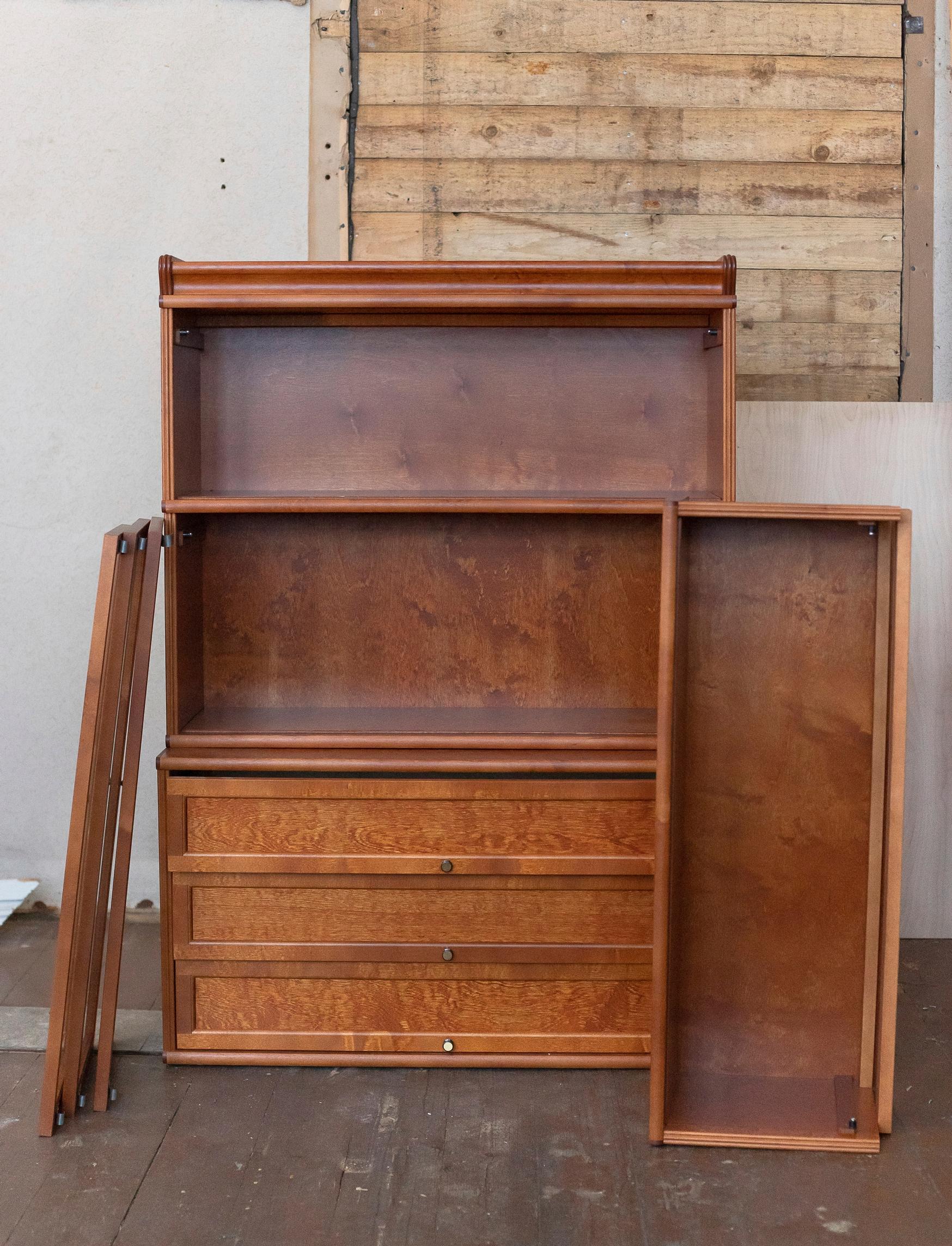 Cherry-colored bookshelf before the makeover