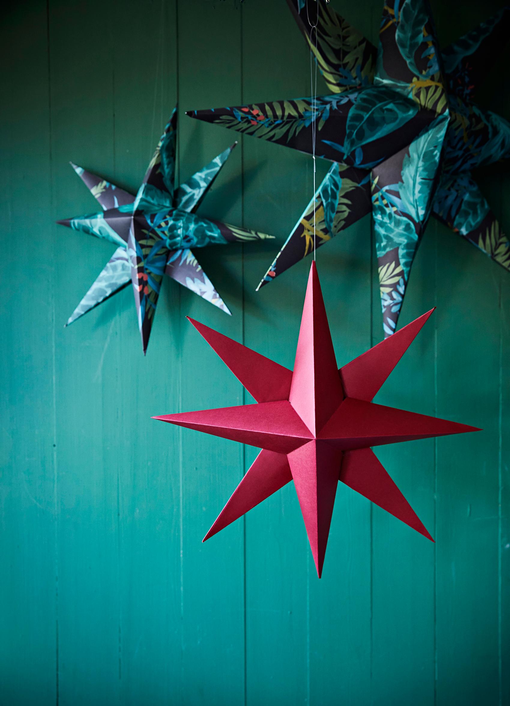 Transform wallpaper scraps into a stunning Christmas star for your window—here’s how!